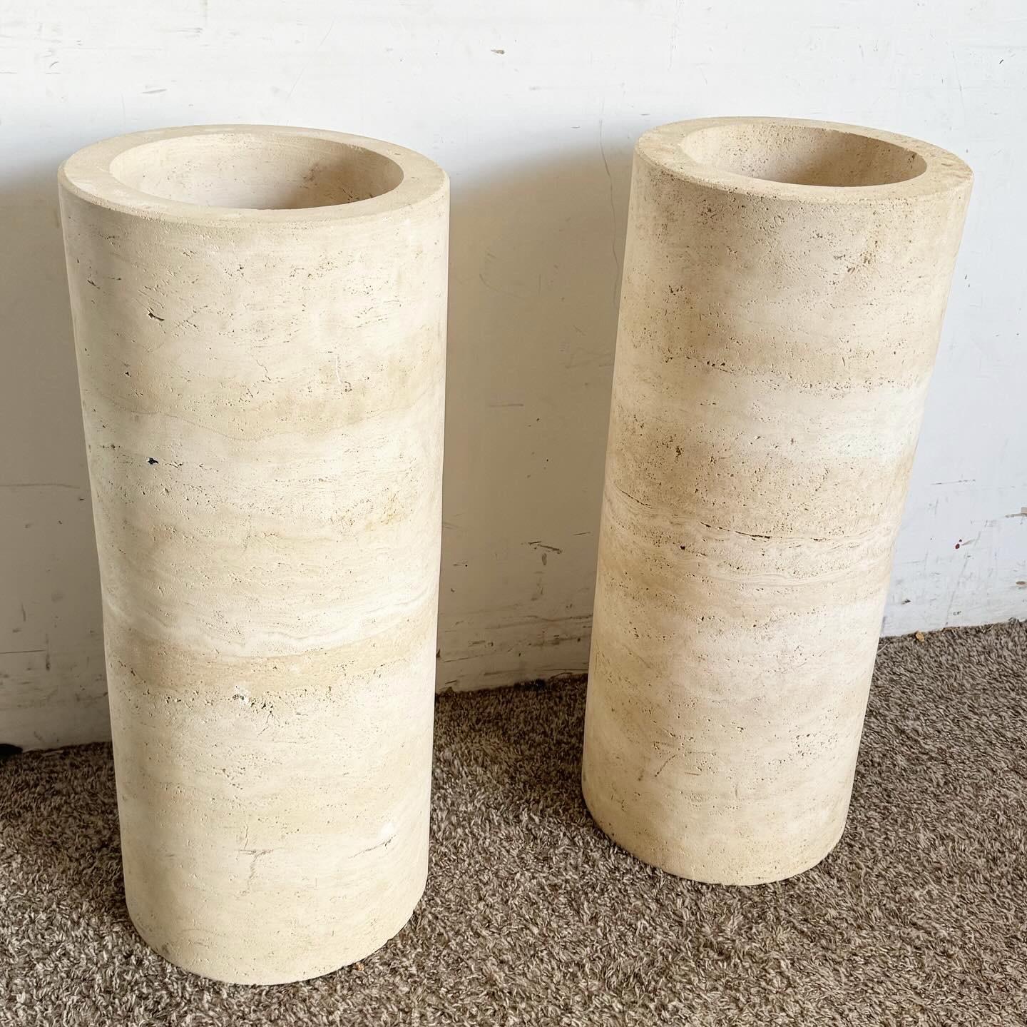 Introduce the timeless elegance of these Italian Travertine Cylindrical Pedestals/Pillars to your decor. Made from luxurious travertine stone, these pedestals offer sophistication and architectural interest, ideal for displaying decorative items or