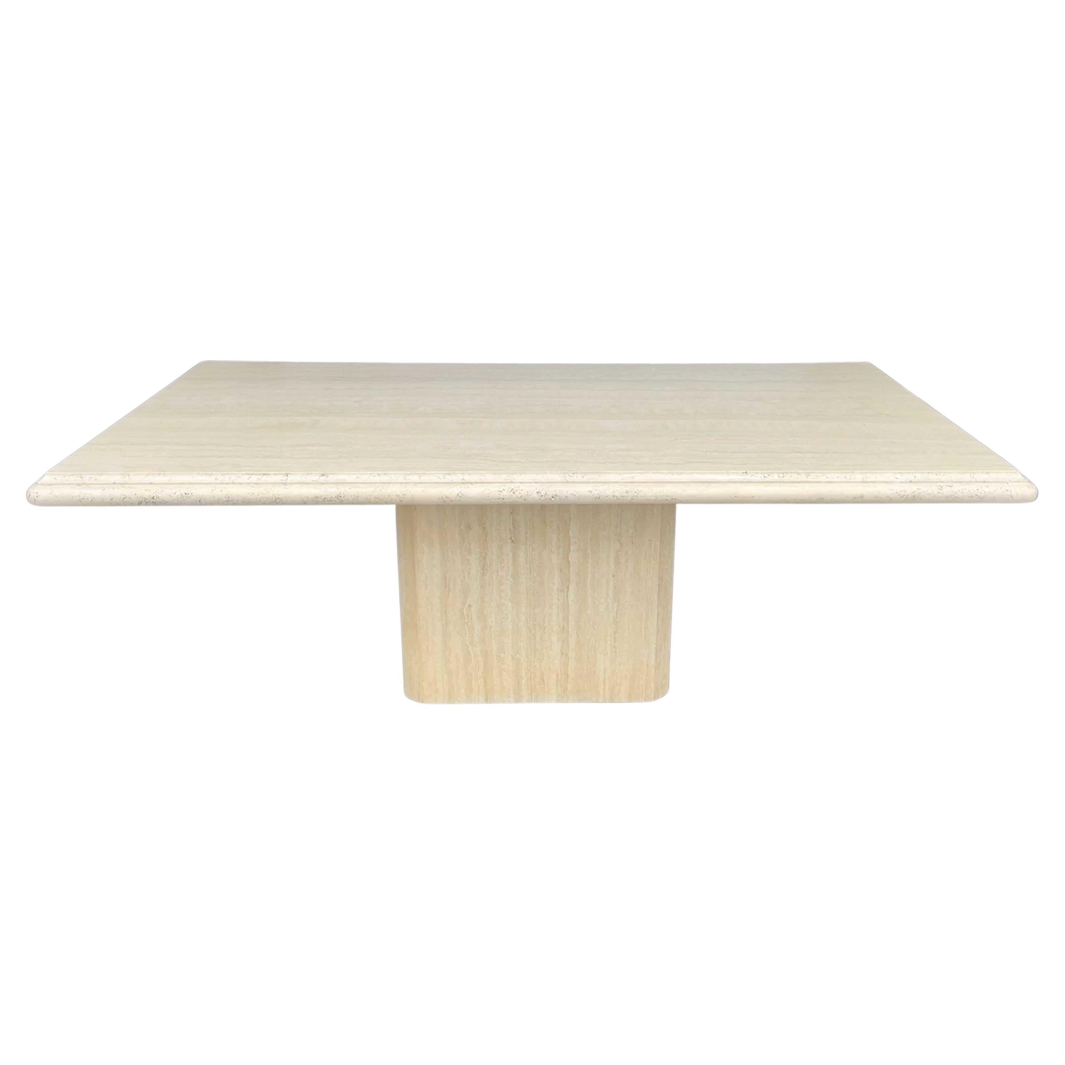SATURDAY SALE

Travertine Dining Table by Lavorazione Artigiana Onice di Luciano Cionini & C. s.n.c. circa 1990's.
30 inches high by 79 inches long by 39.5 inches wide.
Molded beveled bullnose edge.
Monolithic pedestal.
Clean modern lines.
