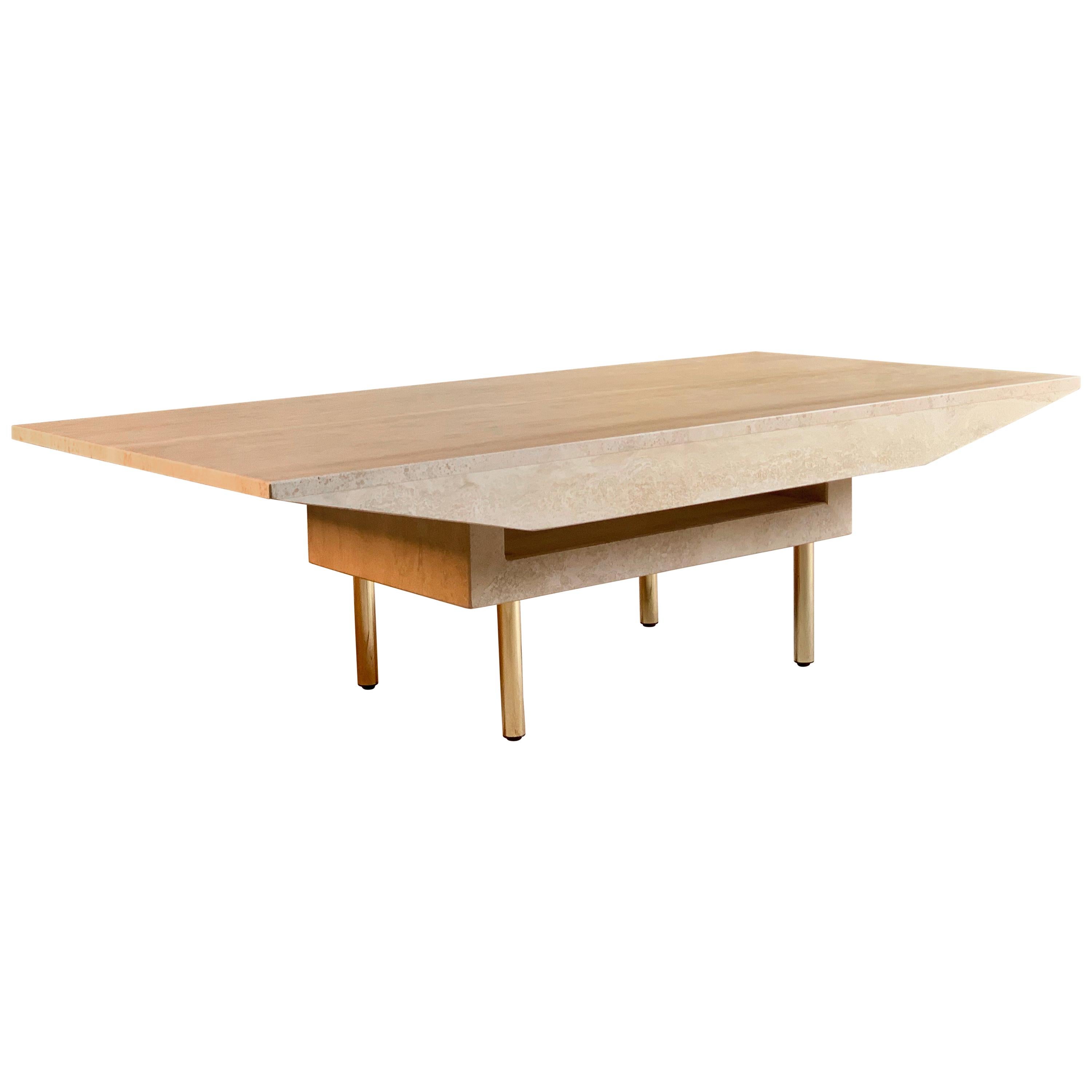 Italian Travertine marble coffee table rectangular shaped sides on base 

Italian Travertine marble coffee table, the solid rectangular top with shaped sides raises on travertine base with four brass legs.

Condition report: 
Offered in