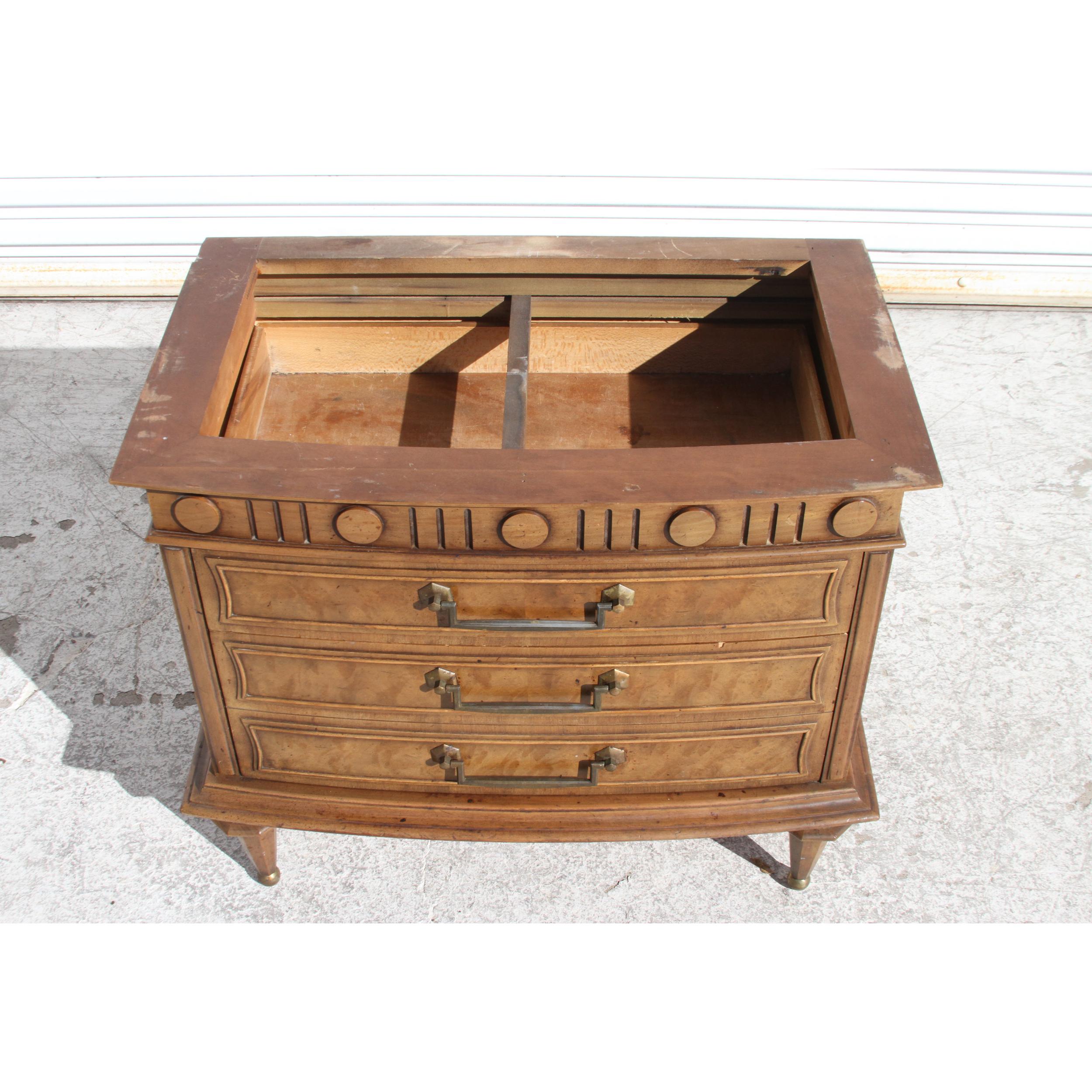 Italian travertine marble top nightstands with brass pulls, ball caps and fluted like legs. They date from the 1940's. Very chic and quite unique in style. 