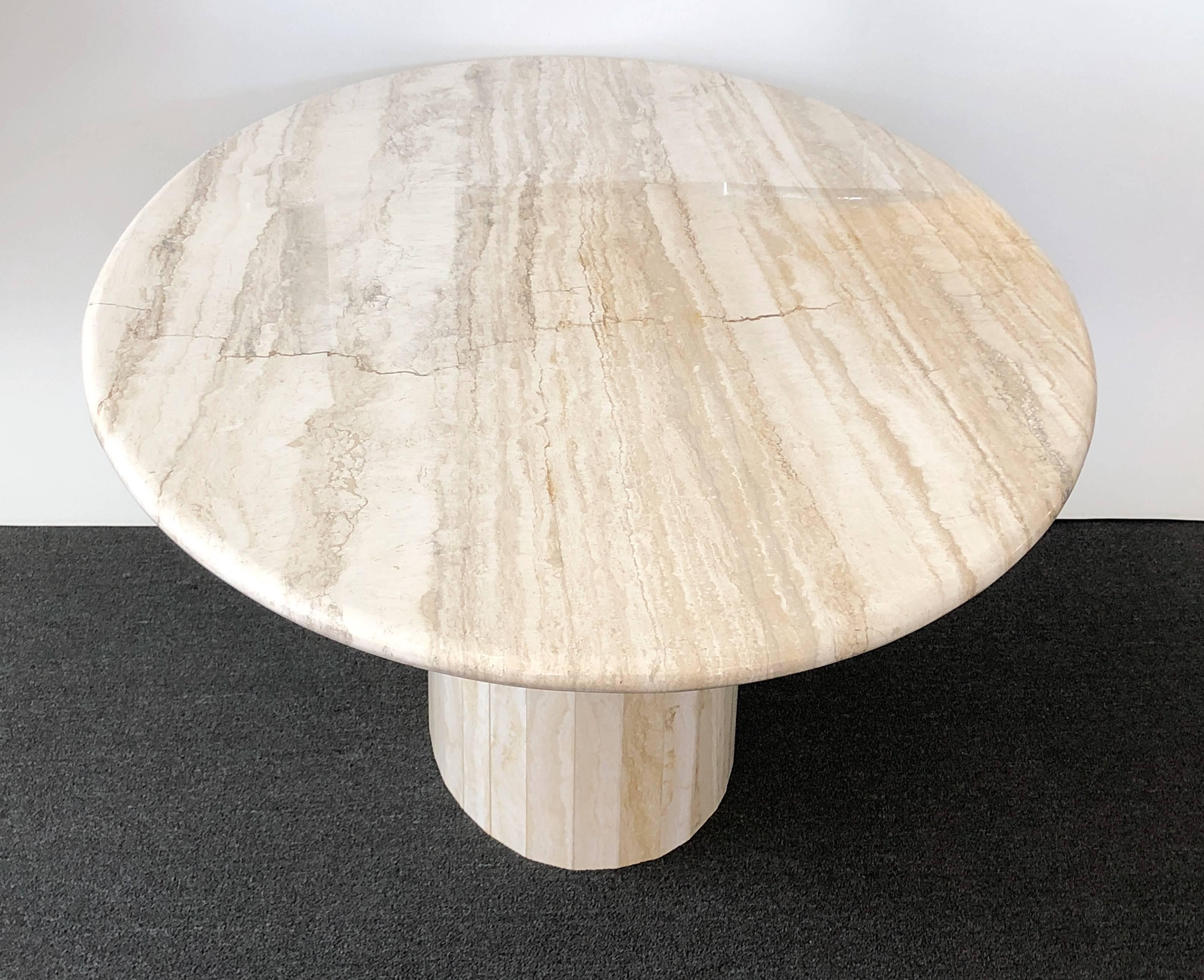 A beautiful Italian travertine oval dining table from the 1970s by Ello.
Seats six people comfortably. Newly professionally polished.
Dimension: 78.5” wide, 47” deep, 28.5” high.