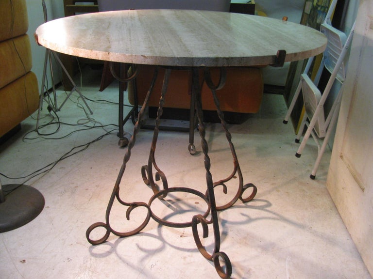 Italian Travertine Round Top with Hand Wrought Iron Base Dining Table