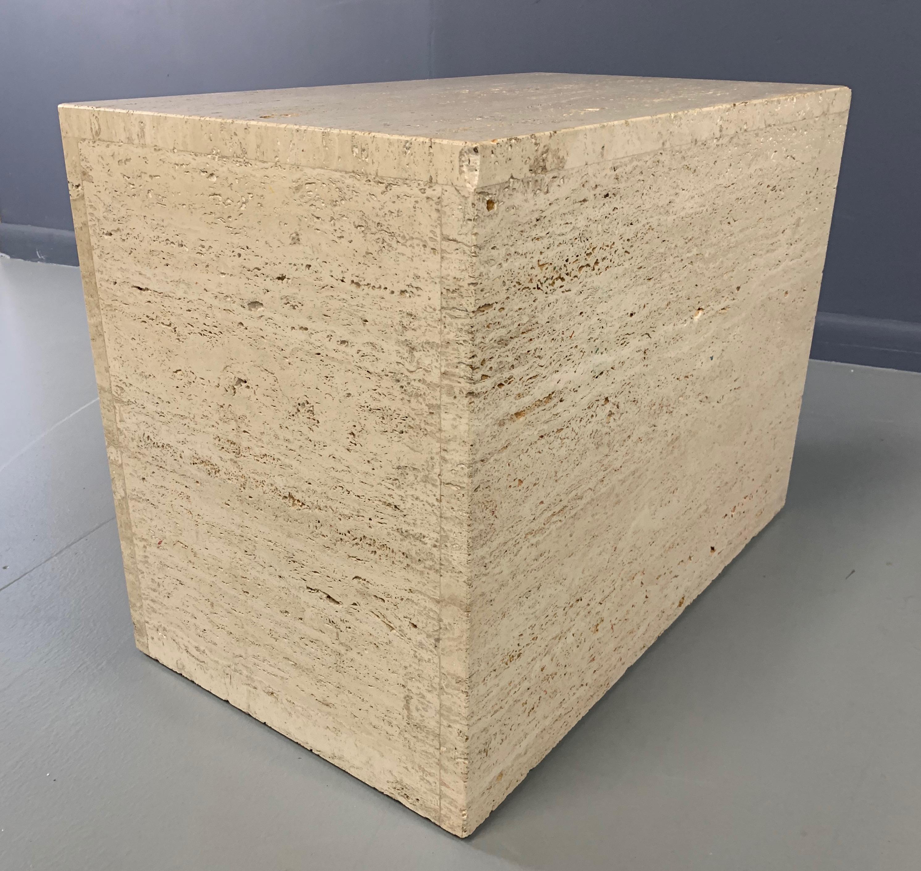This lovely unhoned travertine side table will work in many configurations and styles of design.