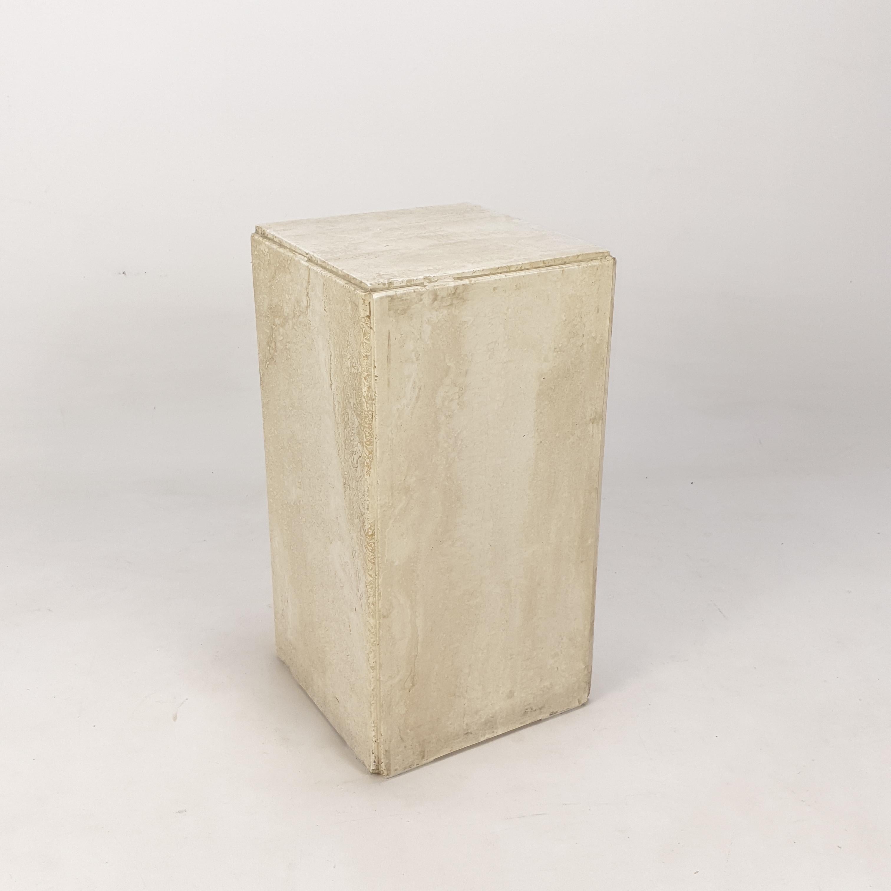 Very nice Italian pedestal or side table, handcrafted out of travertine.
It is fabricated in the early 80's.
  