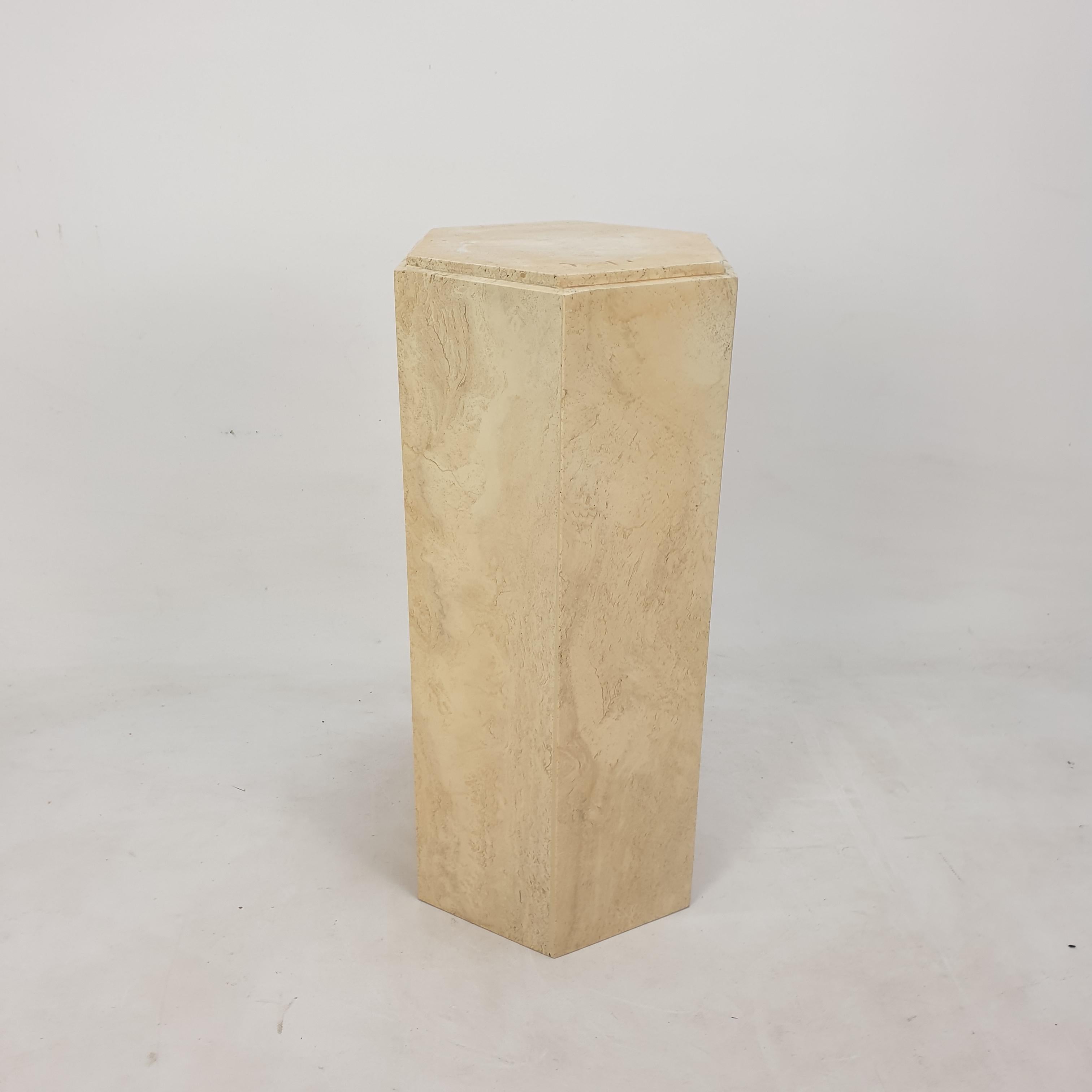 Very nice Italian pedestal or side table, handcrafted out of travertine.
It is fabricated in the early 80's.
 