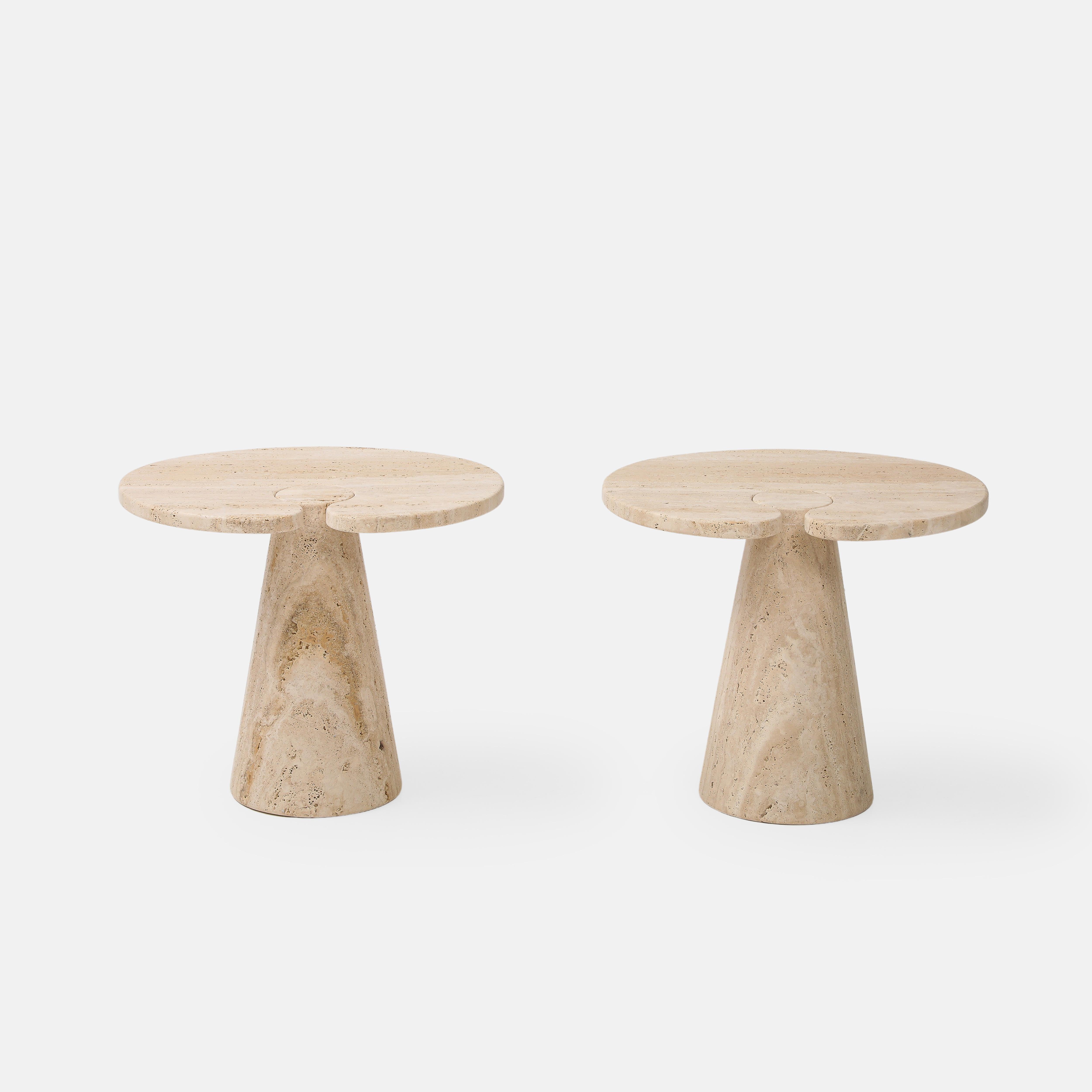 Italian 21st century travertine side tables each with a thick top fitted on a conical base, in the manner of Angelo Mangiarotti. These elegantly organic side tables are made from a beautiful natural stone whose architectural structure is not only