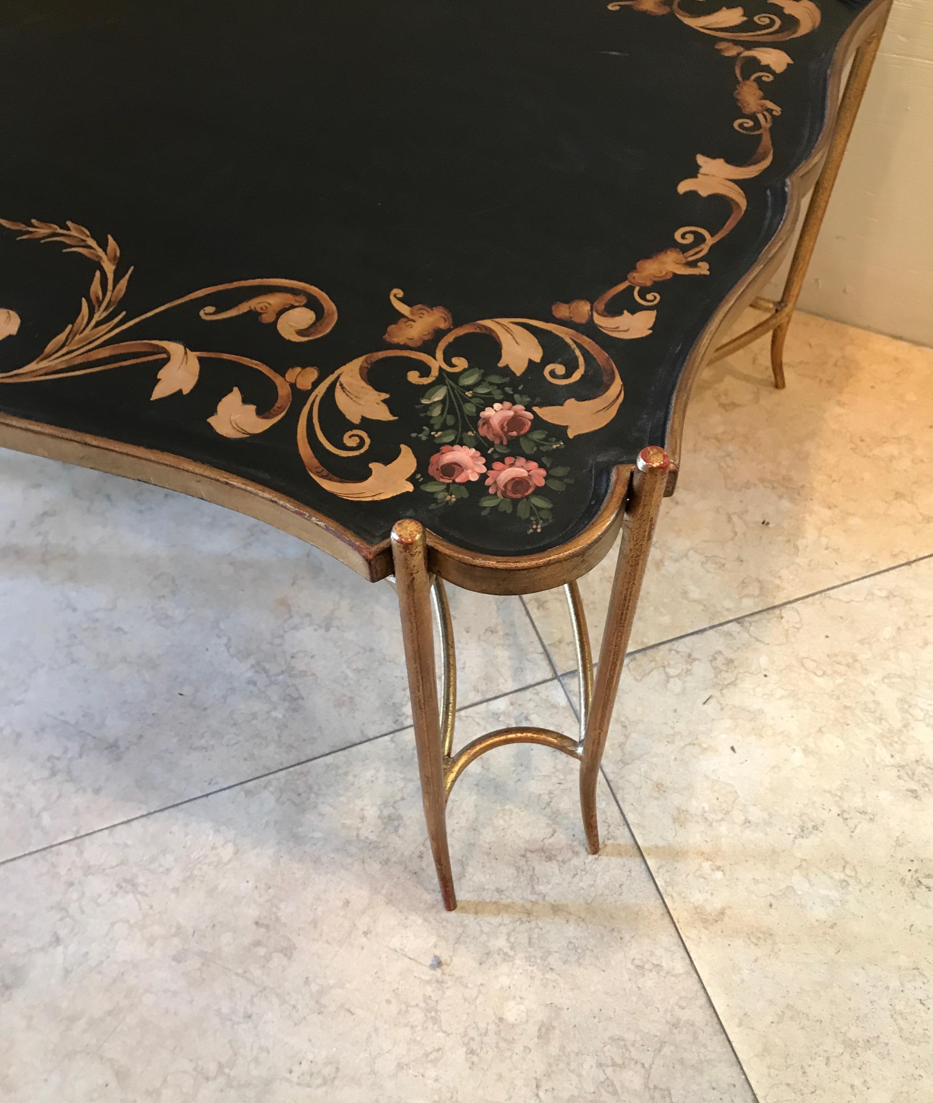 Painted tray top cocktail table with gilded metal base.