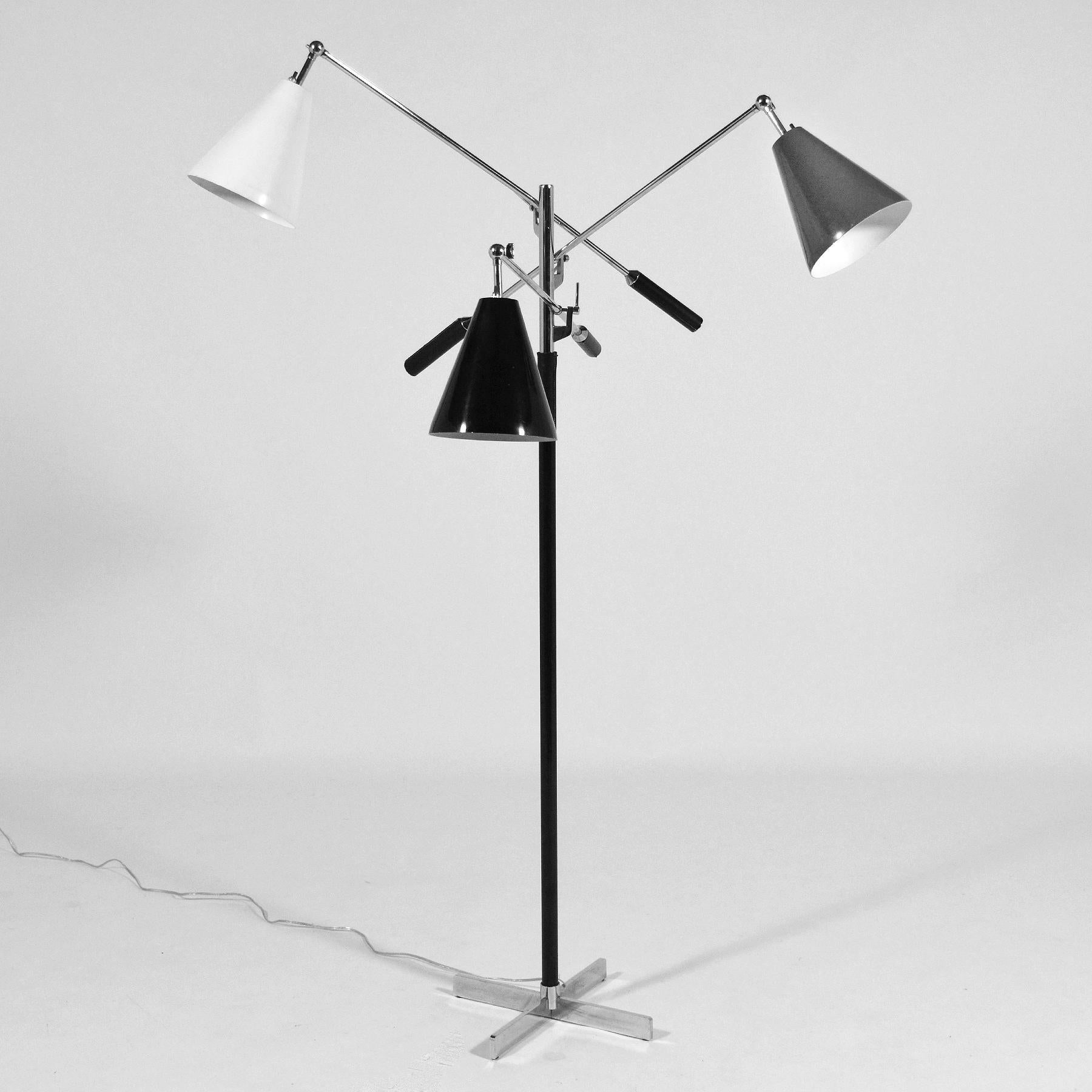 An iconic mid-century design, the Triennale floor lamp is not only beautiful, but a highly functional design. With three articulating arms each topped with an articulating shade the lamp can offer both direct or indirect light in nearly any