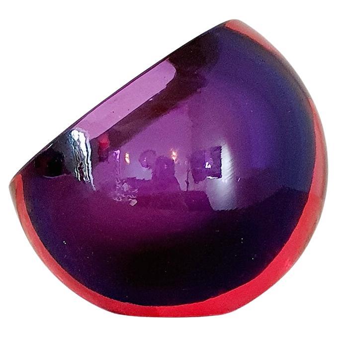 Superb triple sommerso (submerged in the three layers of glass) hand-blown Murano glass bowl. The inner core is deep purple submerged in a layer of pink glass and finally a layer of transparent glass. A beautifully designed spherical bowl which
