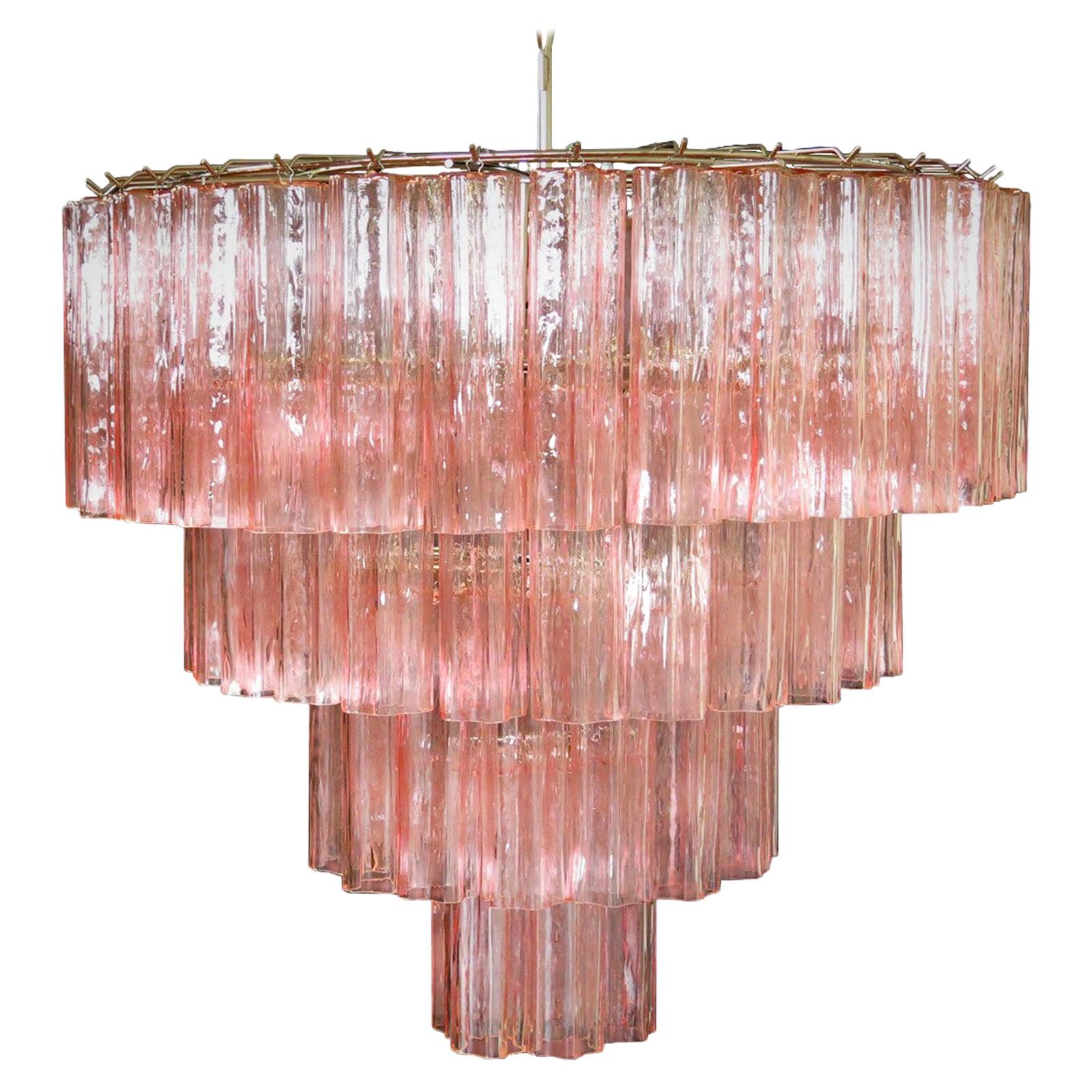 Italian vintage chandelier in Murano glass and nickel-plated metal structure on 4 levels. The armor polished nickel supports 78 large pink glass tubes in a star shape.
Period: Late 20th century
Dimensions: 63 inches (160 cm) height with chain, 35.45