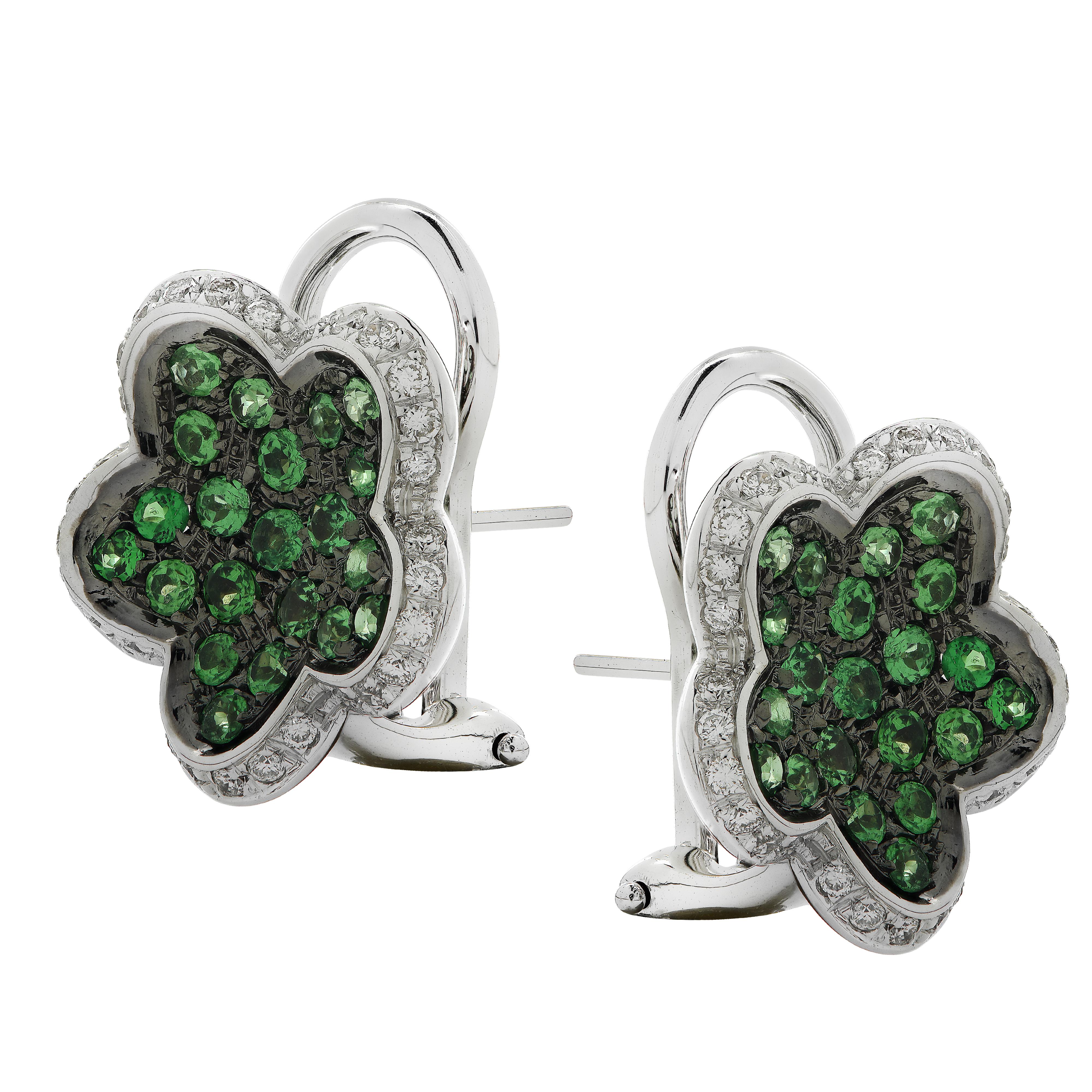 Delightful earrings crafted in Italy in 18 karat white gold with black rhodium, featuring 42 round Tsavorite Garnet weighing approximately 1.26 carats total and 60 round brilliant cut diamonds weighing approximately .6 carats total, G color, VS