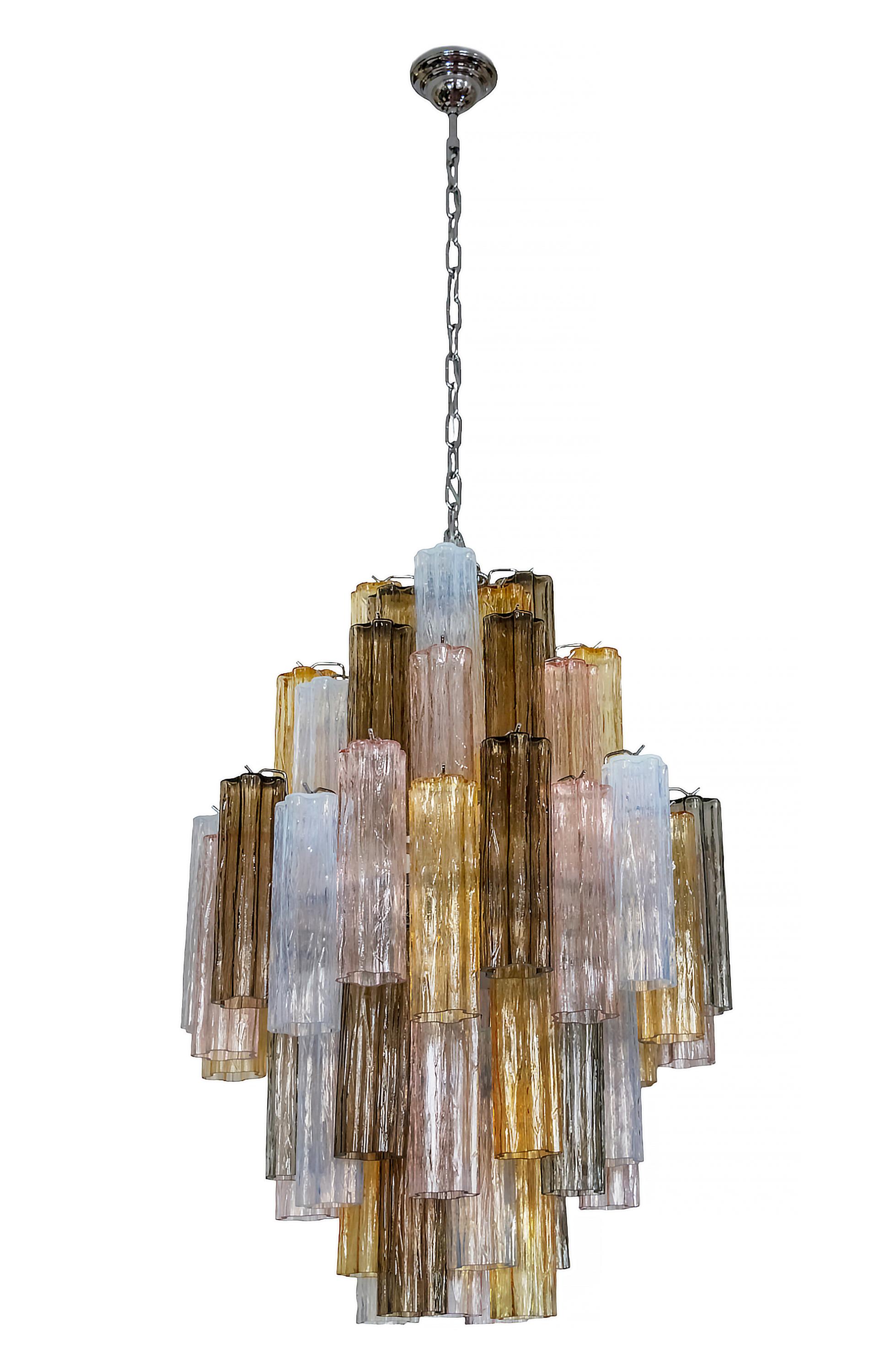 Italian handmade Murano glass chandelier.
The design of this chandelier is made in chrome base with 5 colors Tubi Tronchi glass elements. 
Its is in a very good original vintage condition.
Without chain height is 90 cm.

.