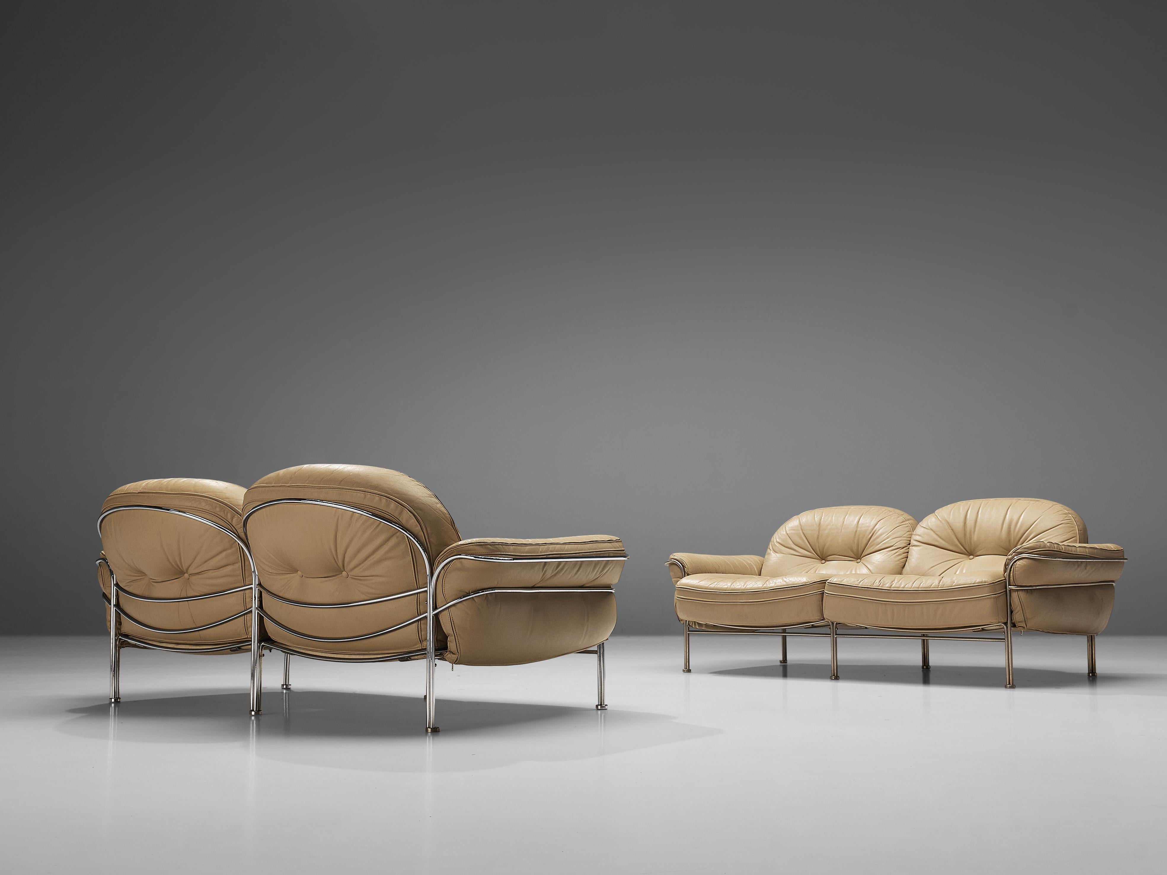Sofas, metal, leather, Italy, 1960s.

Elegant, tubular two seat sofa. The sofa features a curved, chromed frame that holds the tufted, leather cushions. The piece has beautiful soft lines, such as rounded legs and the curved armrests. This