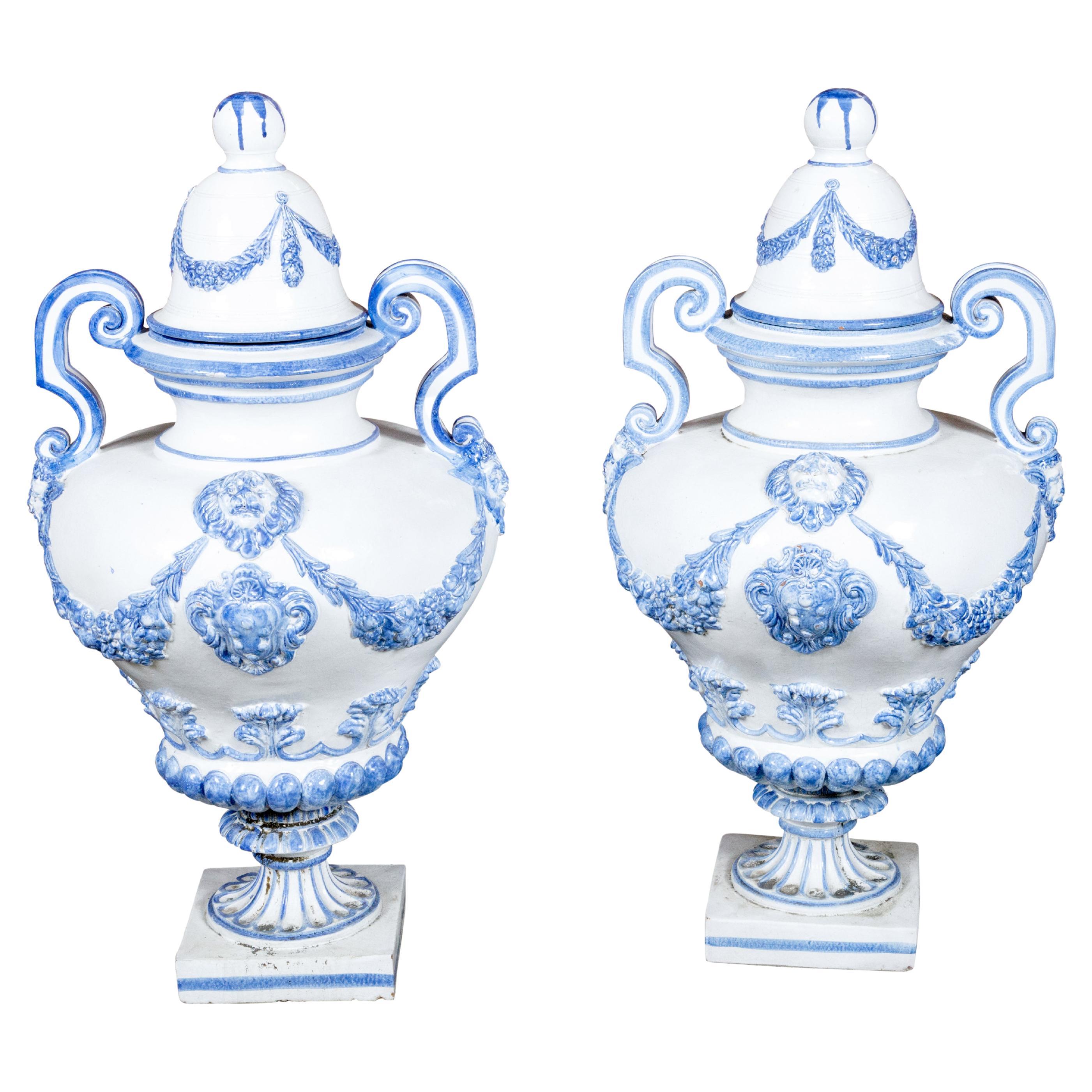 Italian Turn of the Century Blue and White Faience Lidded Jars with Fauns, Pair For Sale