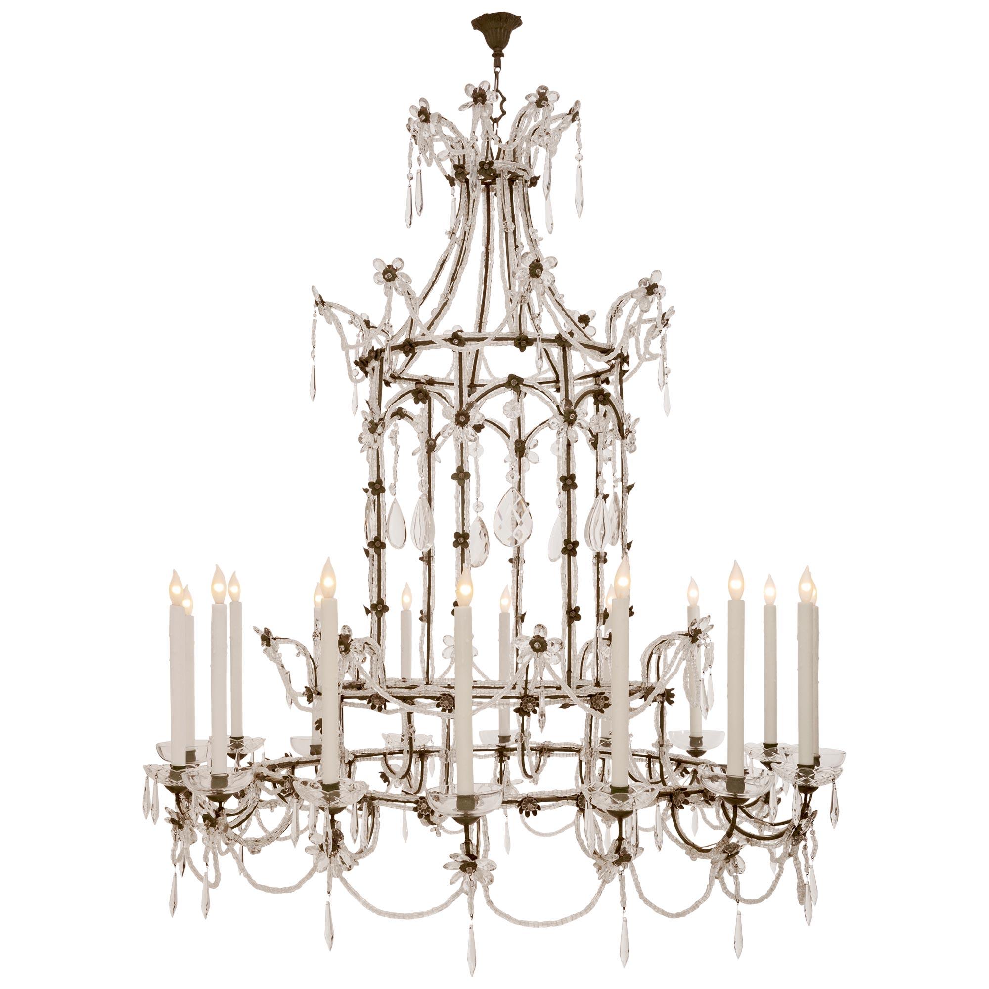Italian Turn Of The Century Iron, Crystal And Cut Glass Chandelier In Good Condition For Sale In West Palm Beach, FL