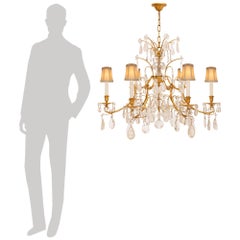 Italienischer Kronleuchter aus vergoldetem Metall und Bergkristall im Stil Louis XV. der Jahrhundertwende