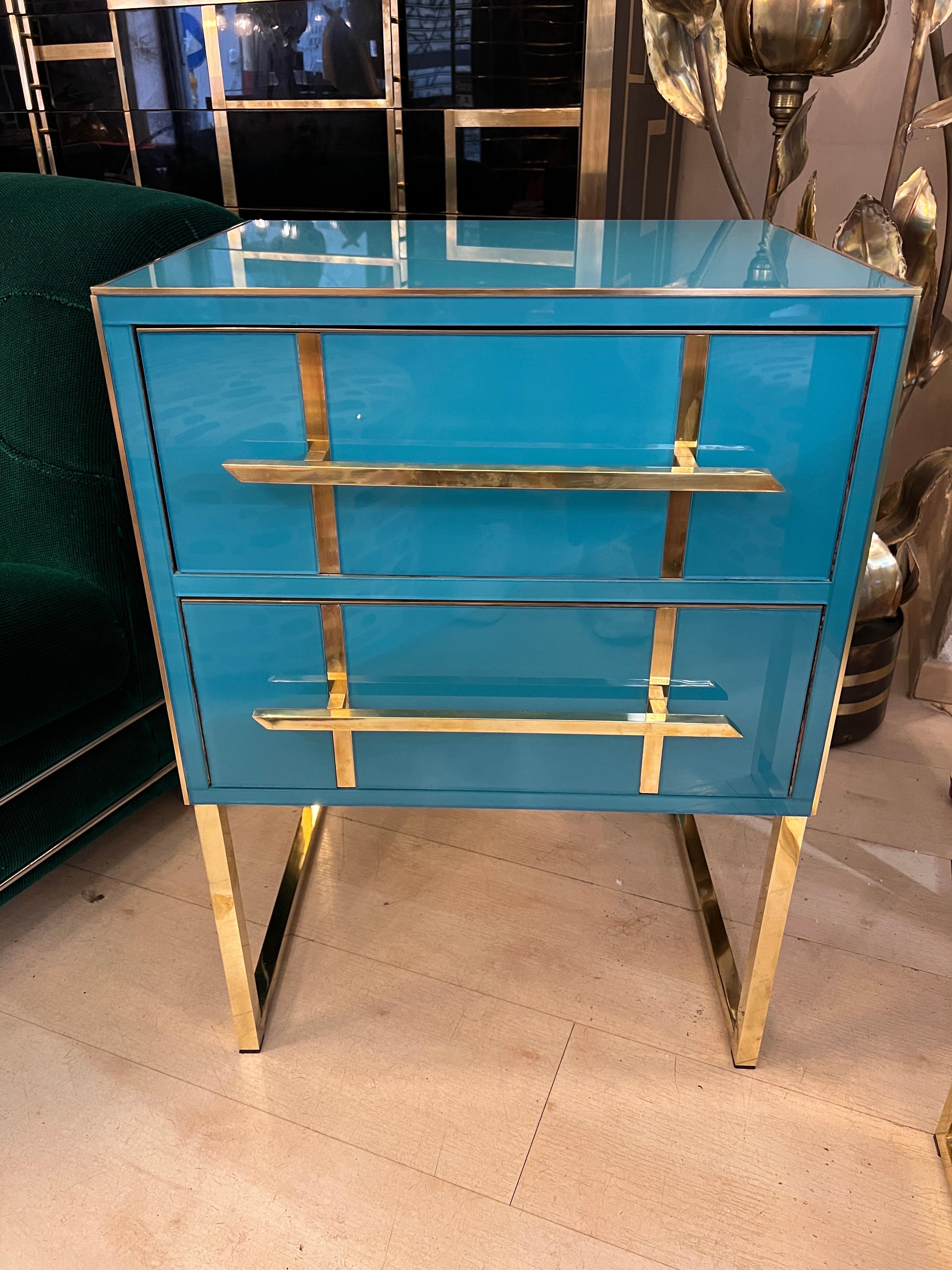 Italian turquoise opaline glass nightstands with two drawers, brass handles, inlays and legs. Can be also used as end tables.