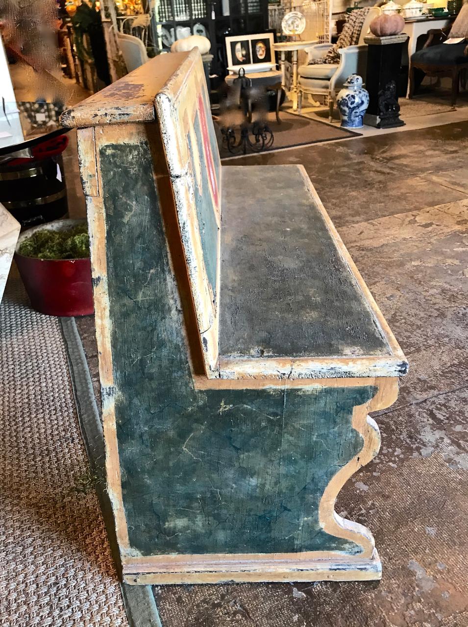 The is a great example of a late 18th century Tuscan pine bench that has been painted in faux marble typical of the period and bearing a coat of arms. The bench was hand planed, both square head and rose nails are present, both indicative of an 18th