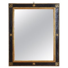 Italiano, Toscana, Specchio a stella in legno dorato ed ebanizzato del tardo barocco, fine XVII sec.