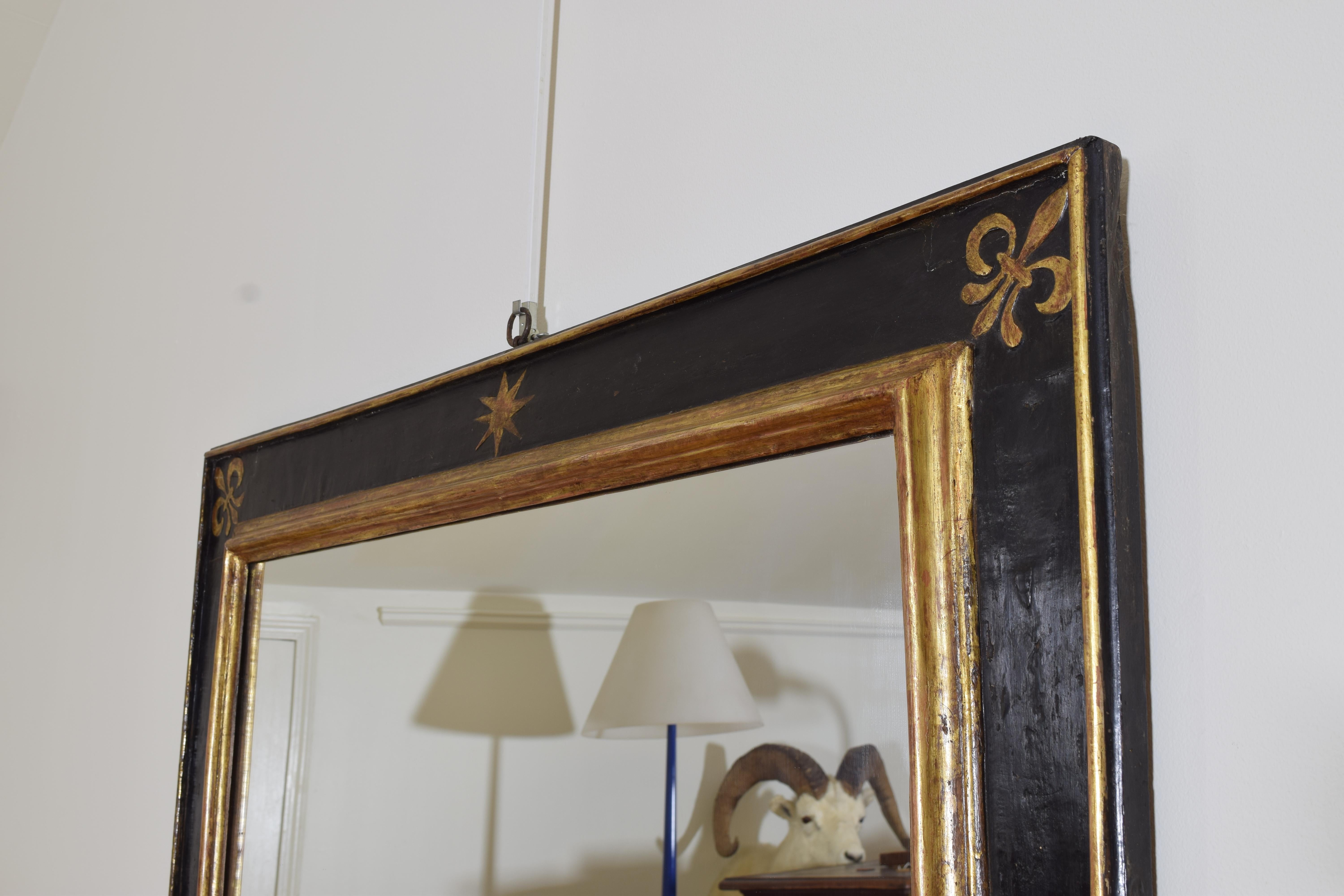 Late 17th Century Italian, Tuscany, Late Baroque Giltwood and Ebonized Star Mirror, Late 17th C For Sale