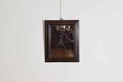 Italian, Tuscany, LXIV Period Walnut and Ebonized Mirror, early 18th century
