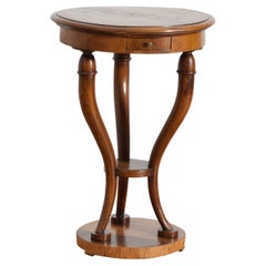 Italian, Tuscany, Neoclassical Walnut
Inlaid 3-drawer Round Table, ca. 1830