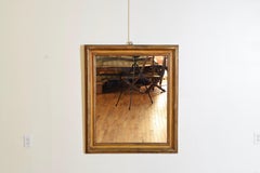 Italian, Tuscany, Painted and Giltwood Mirror, early 18th century