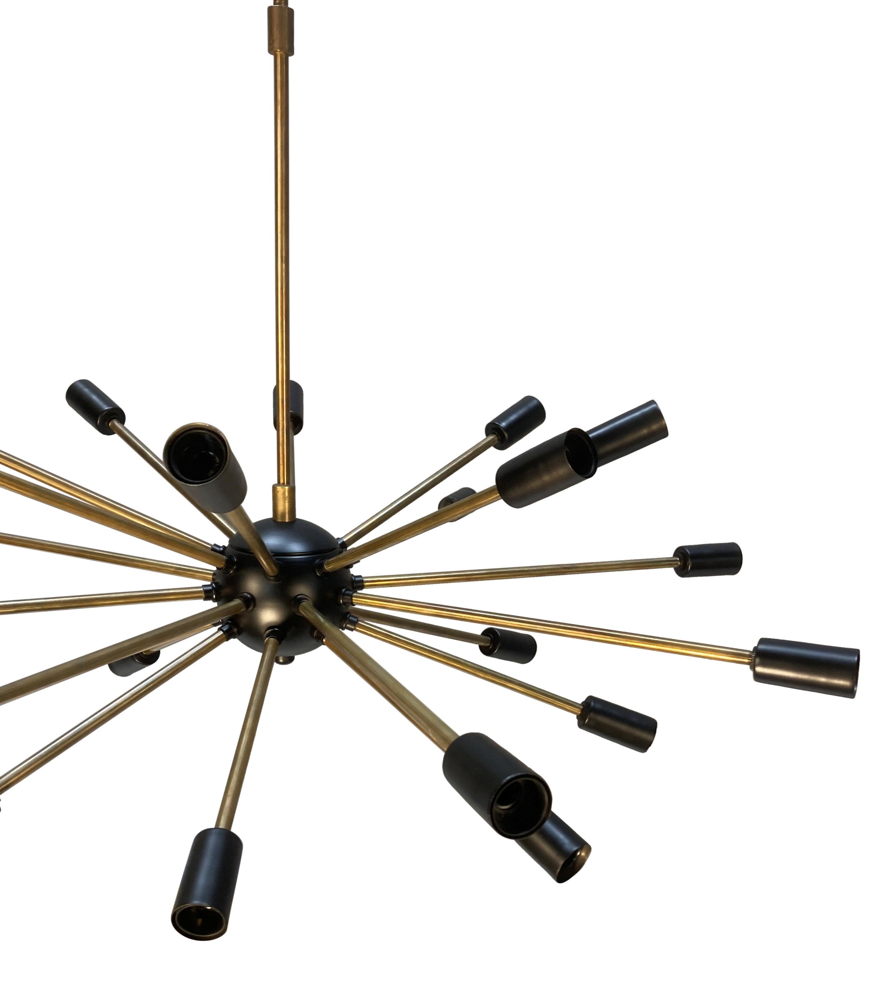 An Italian sputnik chandelier in brass, with satin black details comprising twenty four radiating arms.