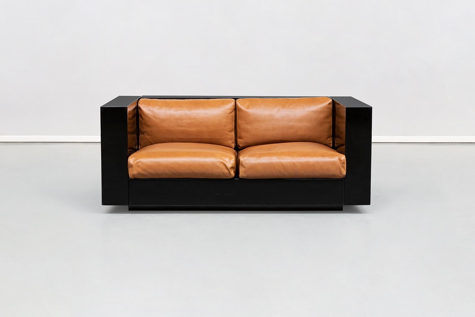 Italian two-seat Saratoga sofa, by Vignelli associates for Poltronova, 1964
Two-seat sofa with rigid structure, made by assembling four elements of equal thickness, with rounded corners, houses slightly protruding seat cushions. The desired purity