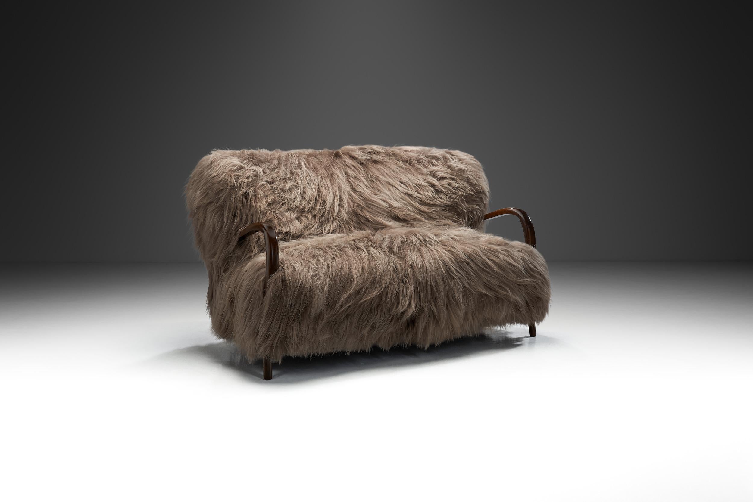 Italian furniture from the mid-century era is defined by an elegant design aesthetic, perfect execution, and exclusivity. The era’s seating models - including this sofa - were created to highlight the spirit of rebirth of post-war furniture
