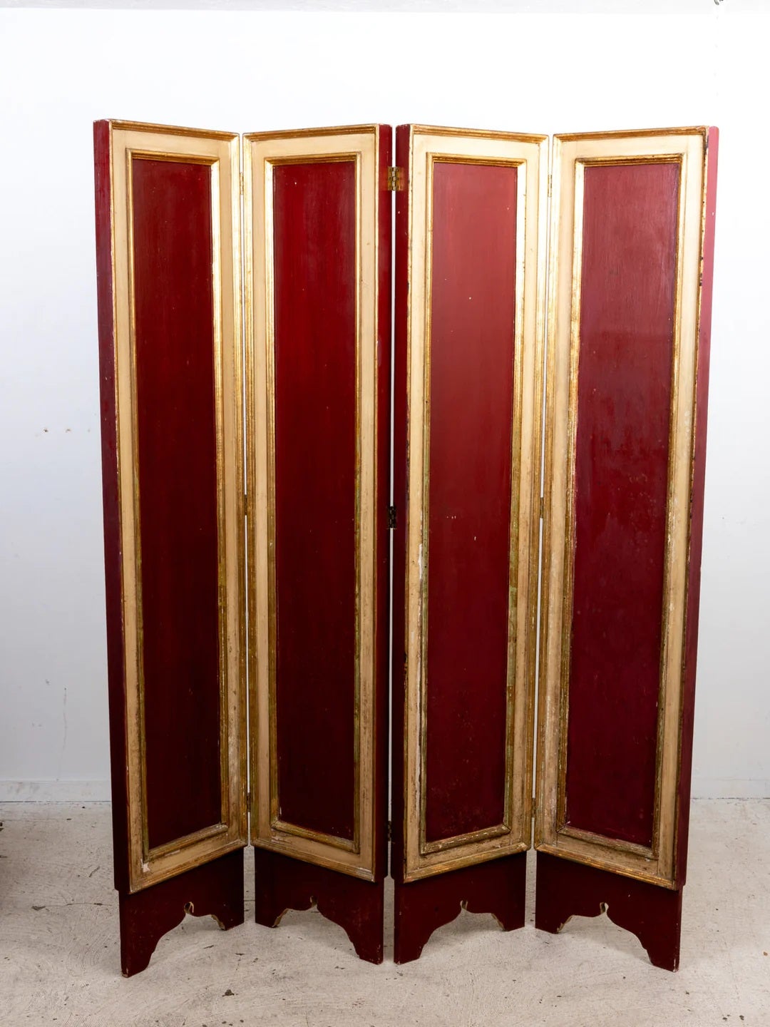 Italian giltwood two sided 4-panel screen, Handcrafted in Italy, this screen features a frame crafted from giltwood, boasting a hand painted cream, red and gold gilt finish. With its four hinged panels, this screen effortlessly transforms any space,
