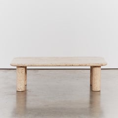 Italian unfilled travertine coffee table with classic column legs