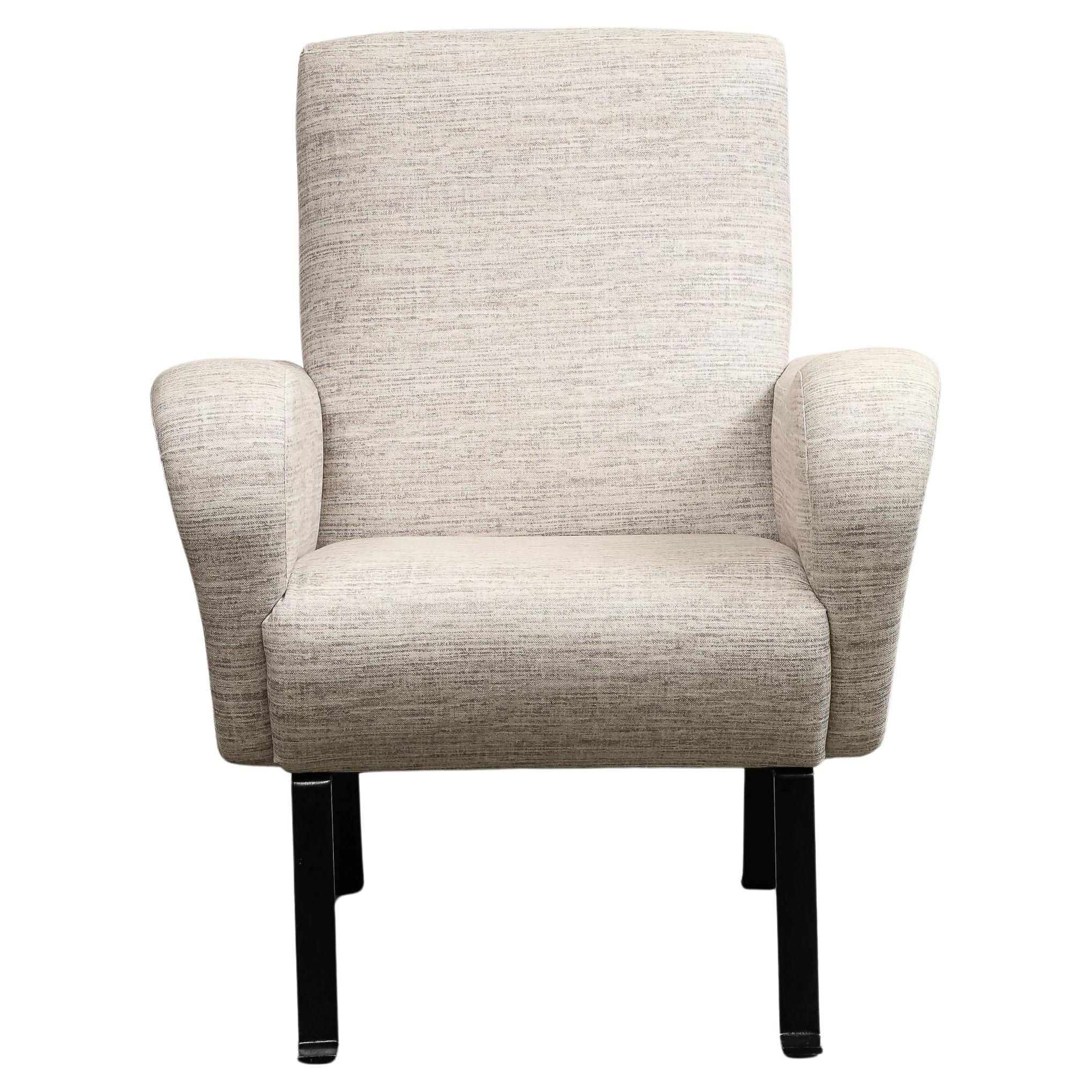 Italian Upholstered Lounge Chair by Luigi Caccia Dominioni for Azucena. The curvy upholstered chair sits atop minimalist enameled steel legs. 

Additional dimensions: 
SH 19