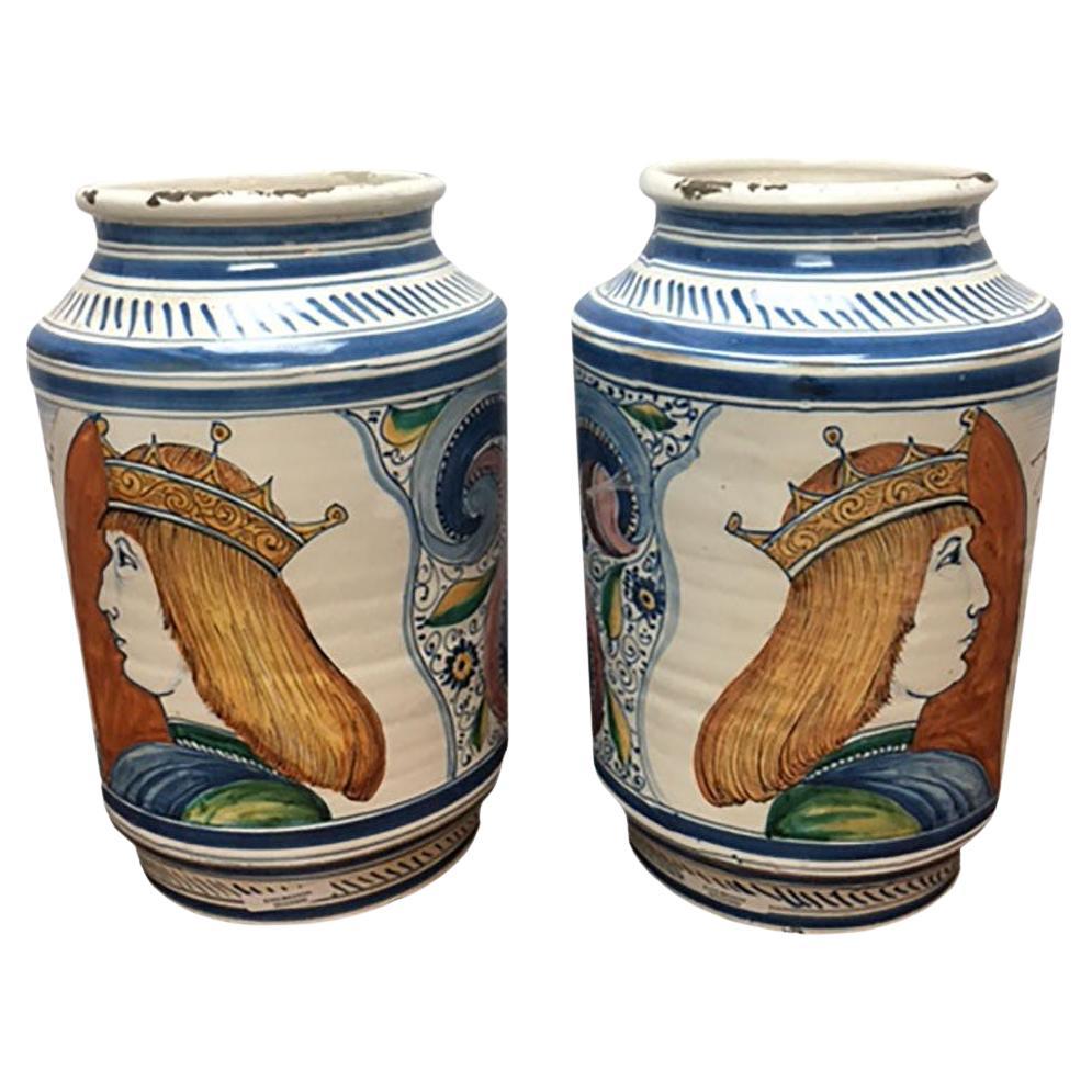 Italian Urns with Male Figures with Crowns, a Pair For Sale