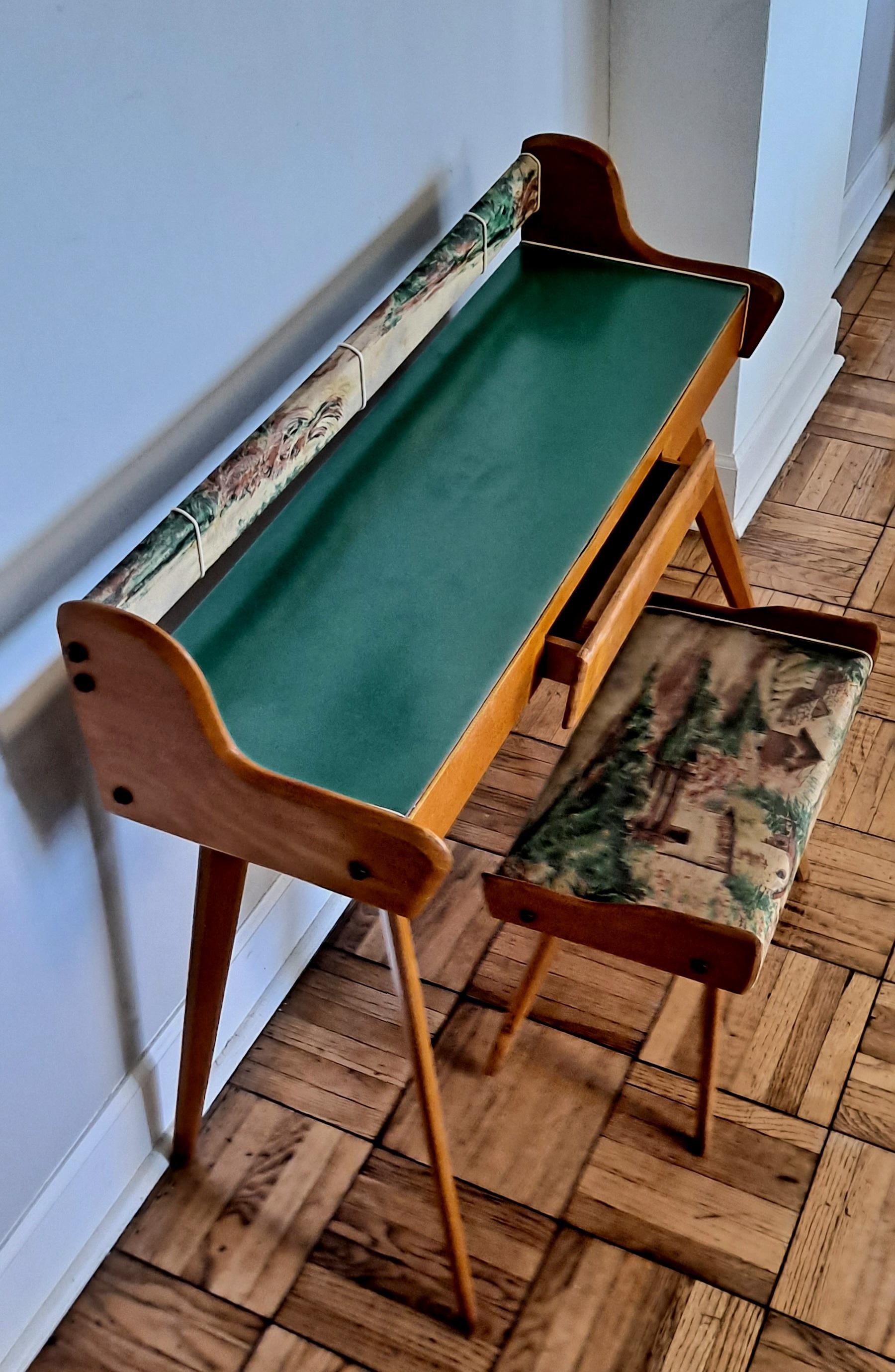 Italian hand made vanity and the stool is in original condition from the 1950 s period.Vanity is made for the wall and it is delicate and elegant made. 
Wood base with the formica on the top original vinyl upholstery .The vanity second Height is