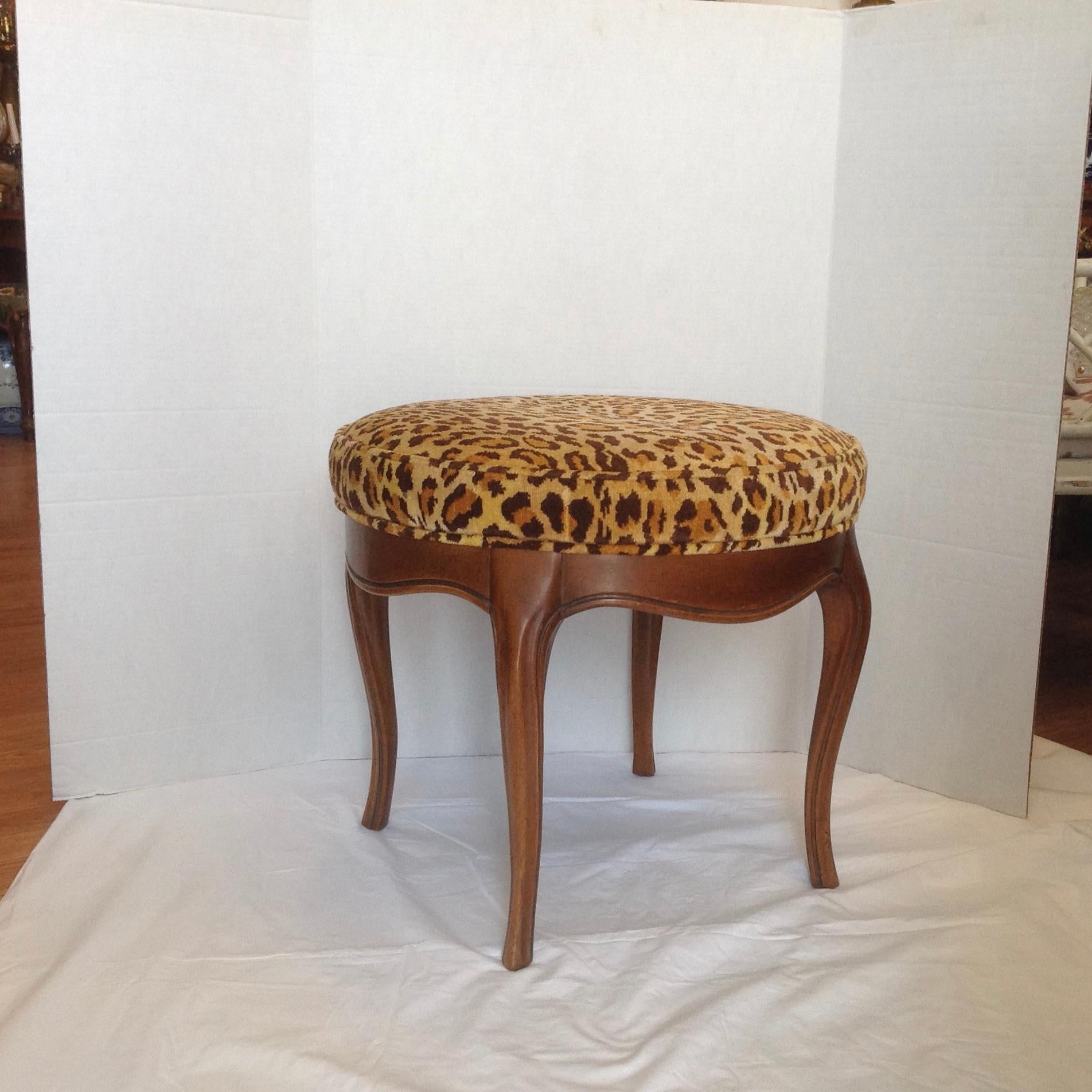 Elegantly fashioned fine Provincial style with dramatic faux leopard upholstery.