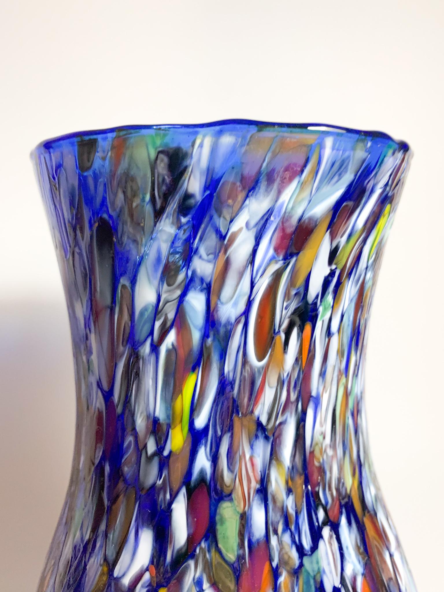 Blue Murano glass vase with Murrine, made by Fratelli Toso in the 1940s
Ø cm 11 h cm 22
Barovier & Toso is a glass factory, known for its handcrafted collections of decorative Murano glass in the 20th century. The chemical innovations of Angelo