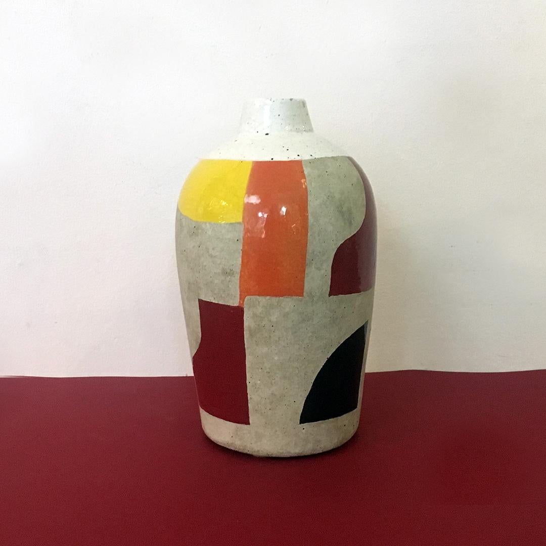 Italian vase in marble powder with parts decorated, 1950s
Vase in marble powder with parts decorated with enamel and traces of crackle on the enamel.
Present a signature of Gio Ponti on the bottom and dating back to the 1950s and 1960s.
Perfect