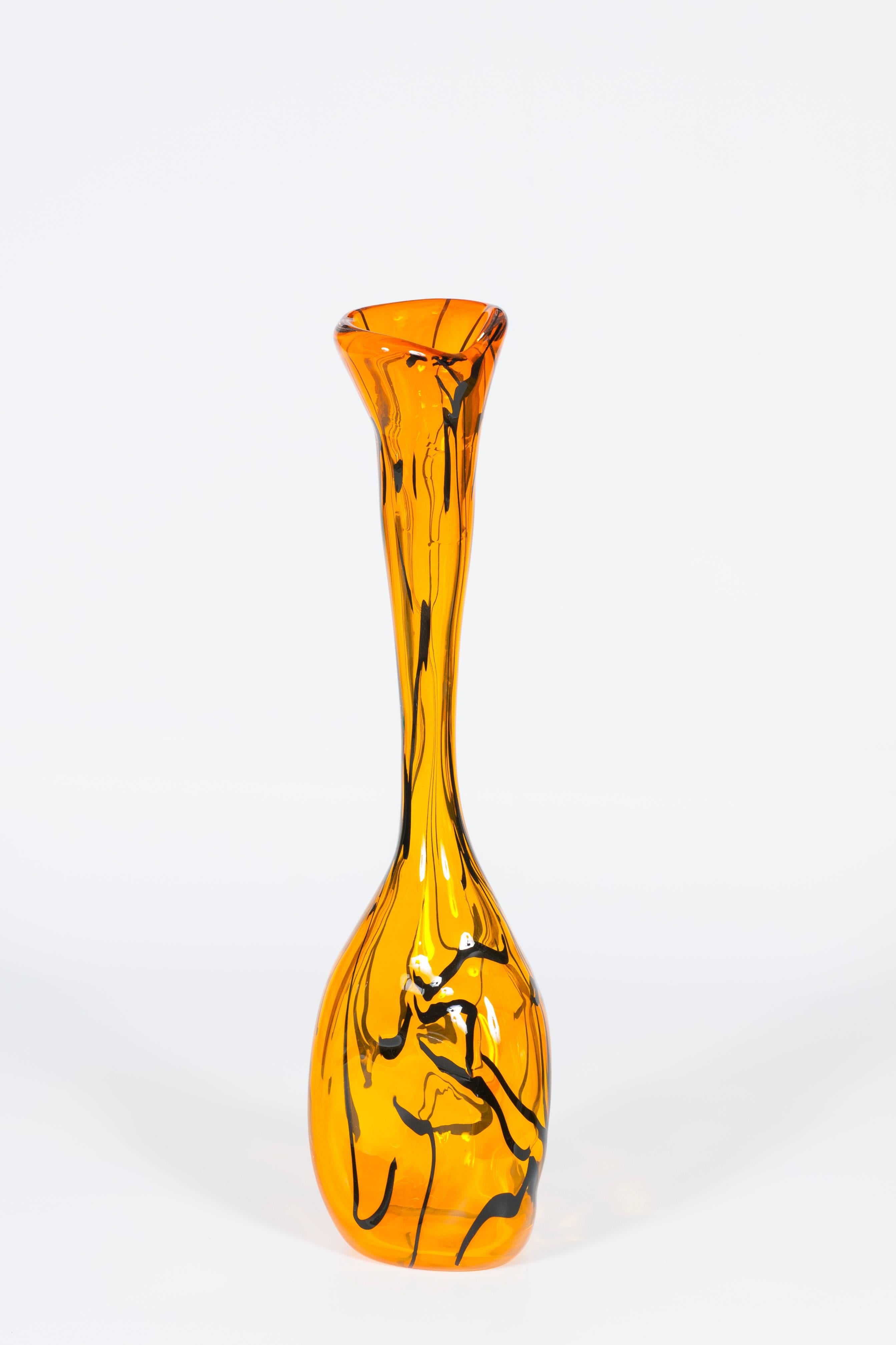 Amazing Italian Venetian, modern vase, blown Murano glass, orange, black stripes, 1990s. Manufactured by blowing the glass by following the school of the best Murano glass makers. Its shape represent the modern society, spontaneous escaping from the