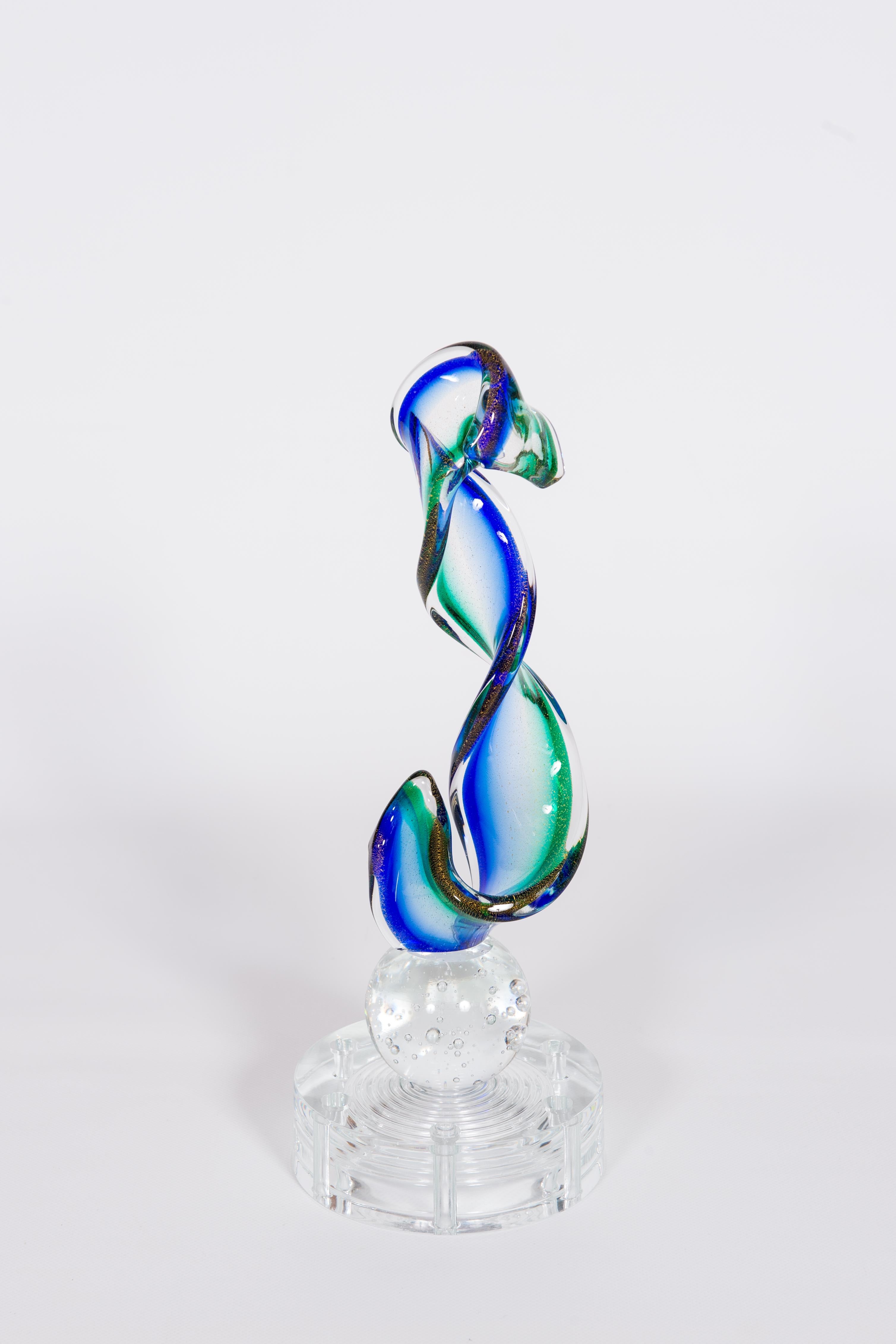 Venetian Abstract Sculpture in Blown Murano Glass Green and Blue 1990s Italy.
A Venetian Masterpiece: A Mid-1990s Blown Murano Glass Abstract Sculpture by Giovanni Dalla Fina
This exceptional work of art, an embodiment of the finest Murano