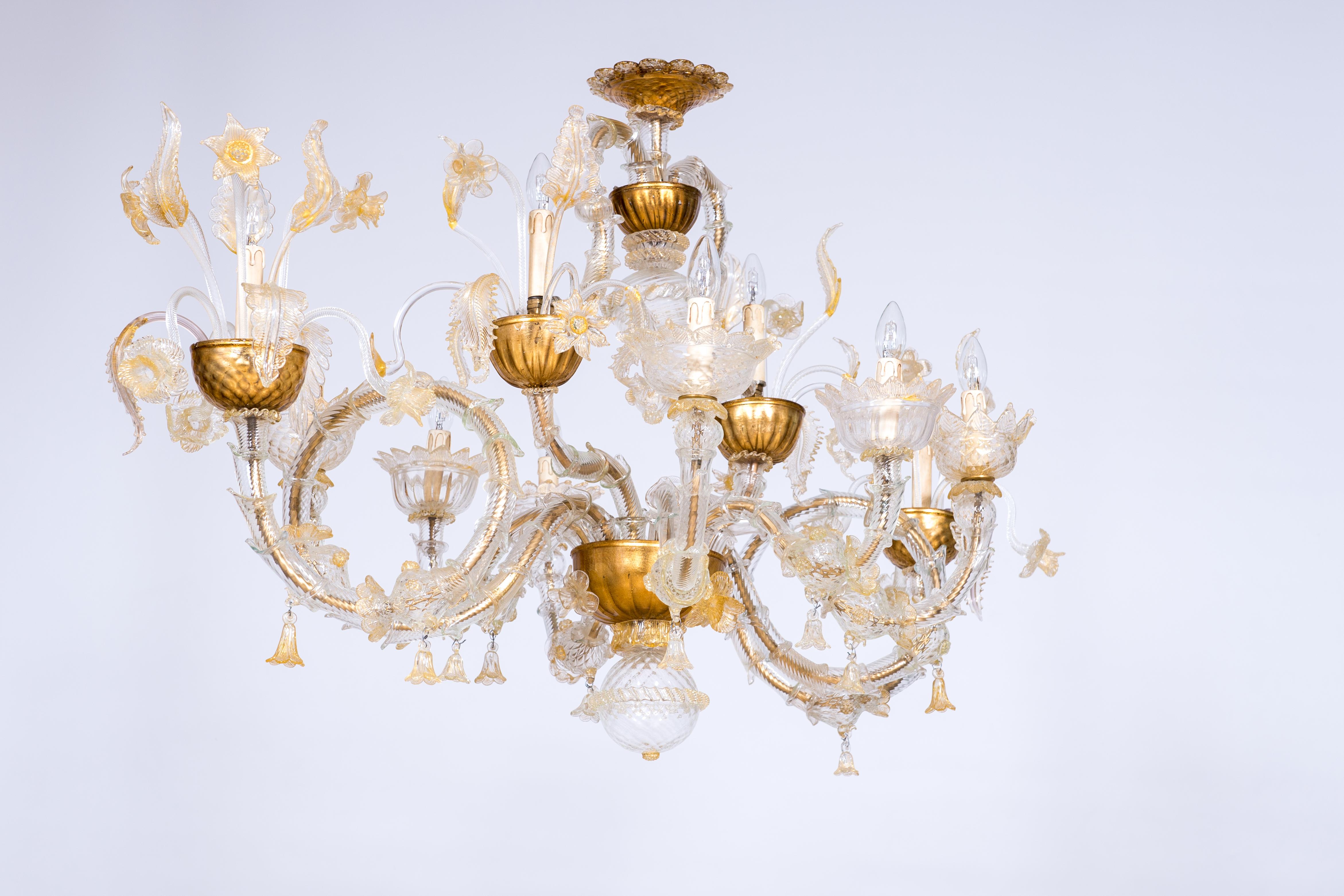 Elegant Italian Venetian Ca' Rezzonico Gondola Chandelier, in blown Murano glass and 24-K Gold. 
This masterpiece was entirely handcrafted and manufactured in the Island of Murano, Venice, where the art of the blown Murano glass is an historical