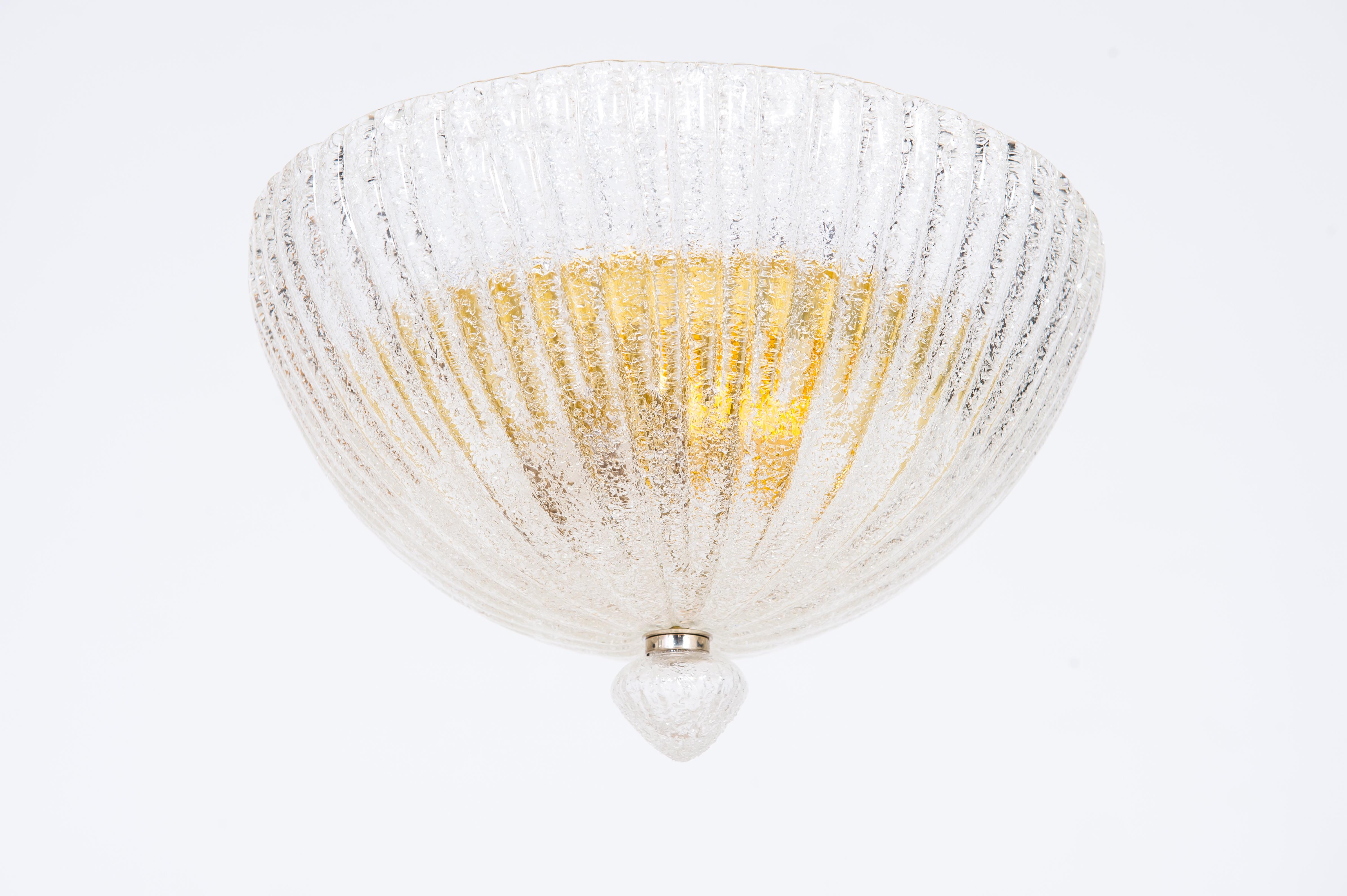 Italian Venetian Circular Flush Mount in Murano Glass Contemporary 2000s
This beautiful work of art stands out for the beauty and refinement of its design and its details. It was made in the 2000s in the Venetian island of Murano by local