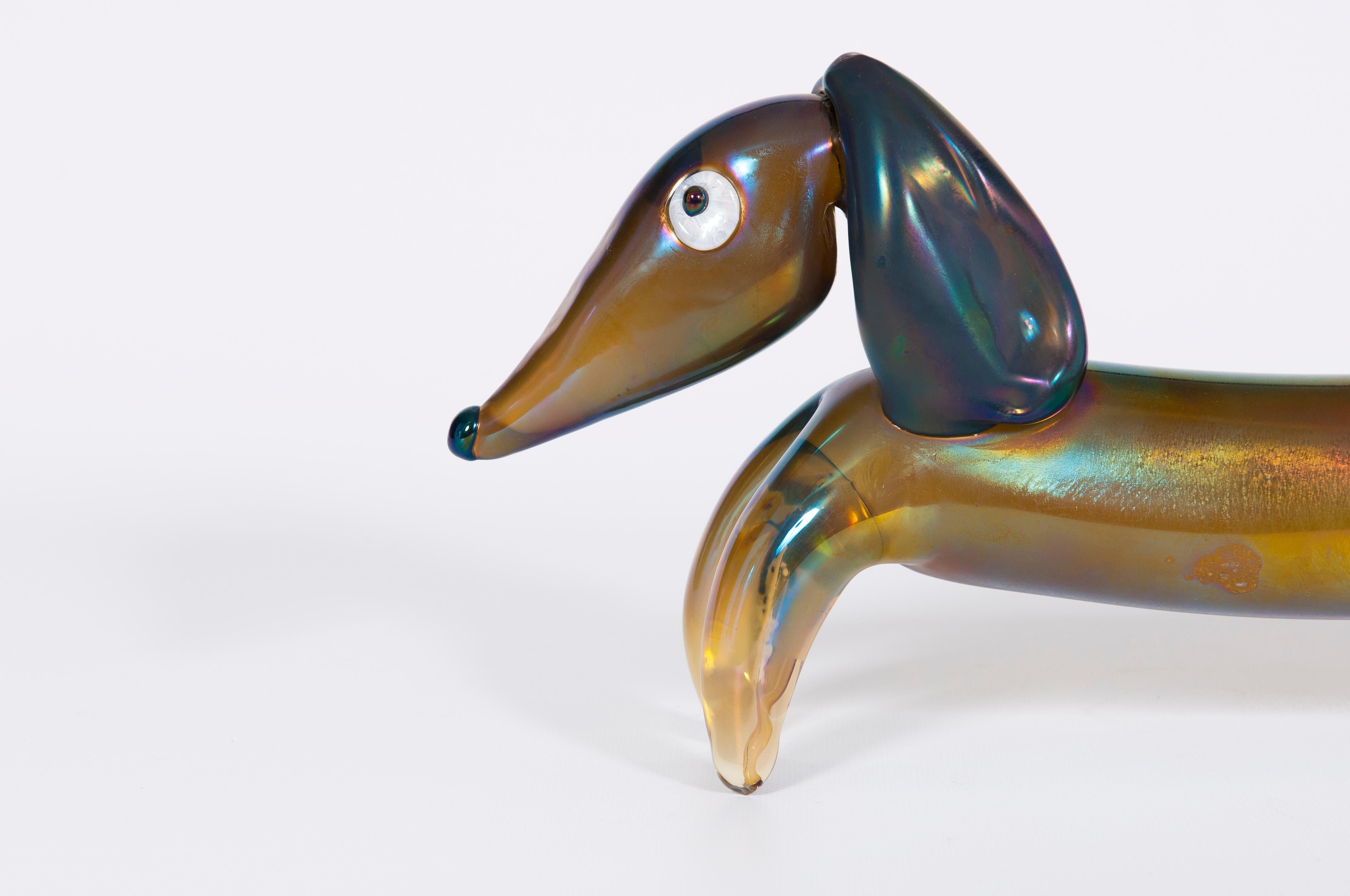 Italian Venetian dog sculpture in blown Murano glass, Iris and multicolor, 1970s.
This is a special unique production, attributed to a Venini collection, entirely manufactures and designed in the Venetian Murano island, from the local artist of the