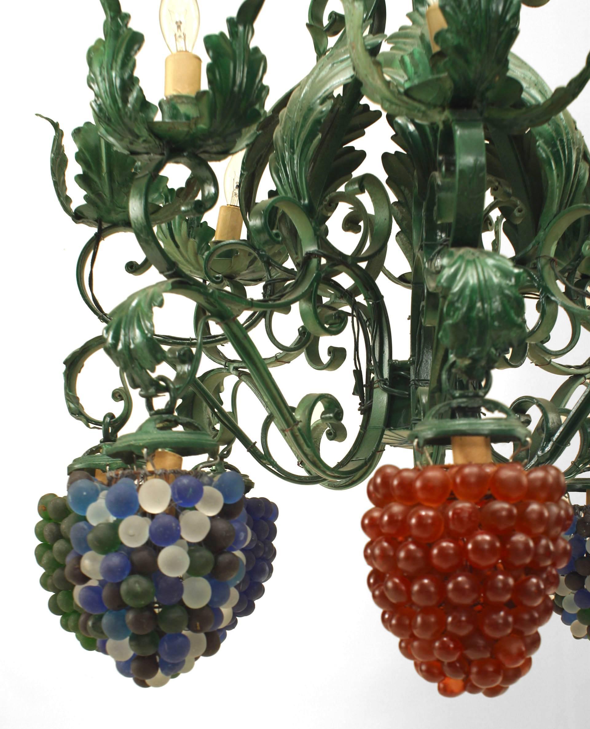 Italian Venetian eight-arm chandelier with green painted metal flowers and leaf design with Murano glass grape shades (pair of pink, blue, green and multicolored).
  