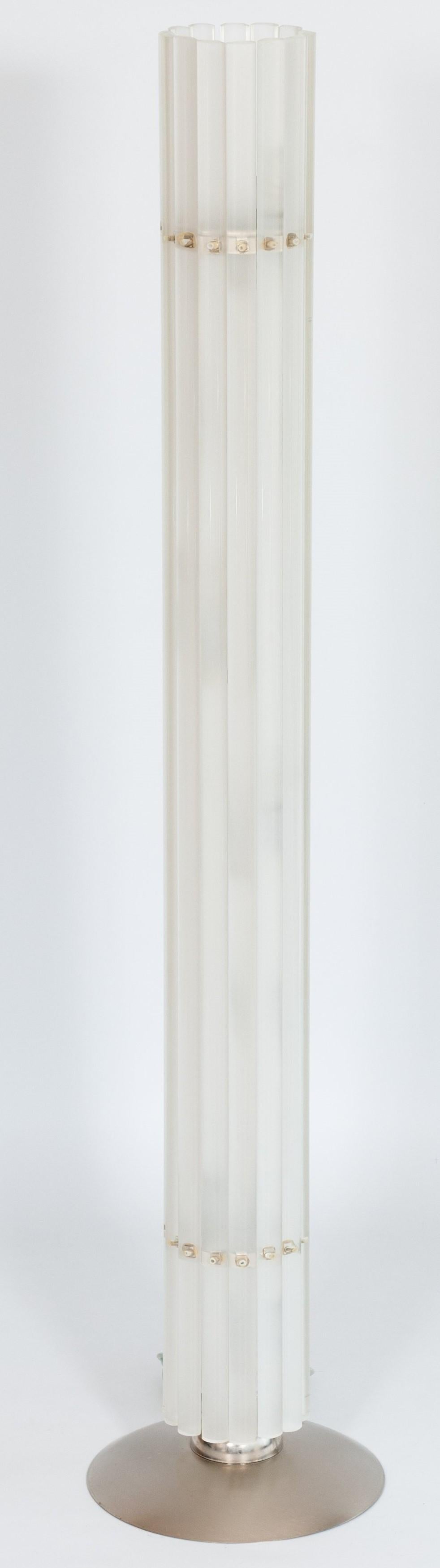 Modern and unique, Italian Venetian, floor lamp, in blown Murano glass, sanded, transparent opaque colored, author vintage Murano gallery, 1980s.
This is a unique floor lamp, made up of a chromed framework, in which are accommodated various glass