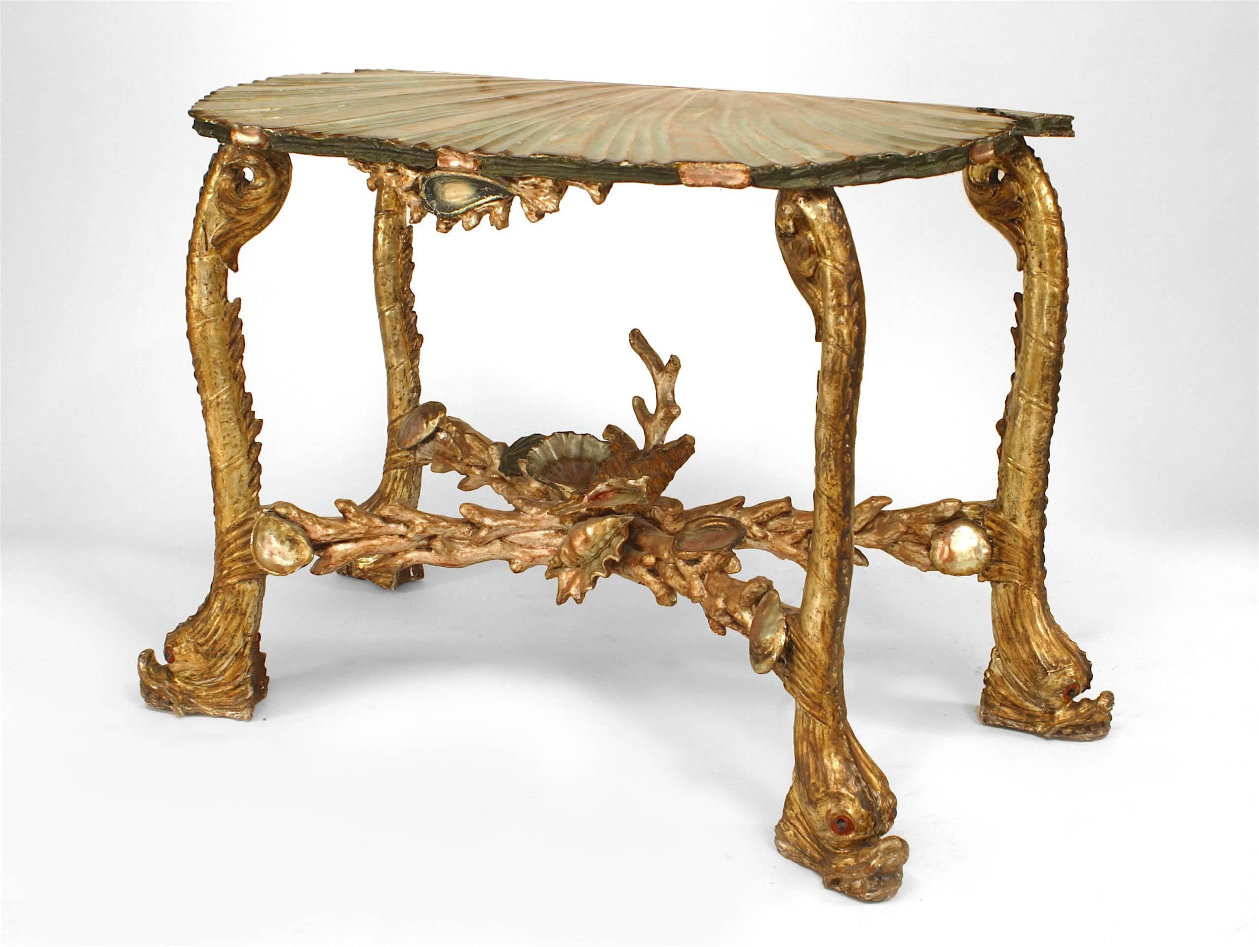 Italian Venetian Grotto style (19th Century) silver polychromed console table with carved sea shell form top and dolphin legs with various crustaceans on a stretcher.
 