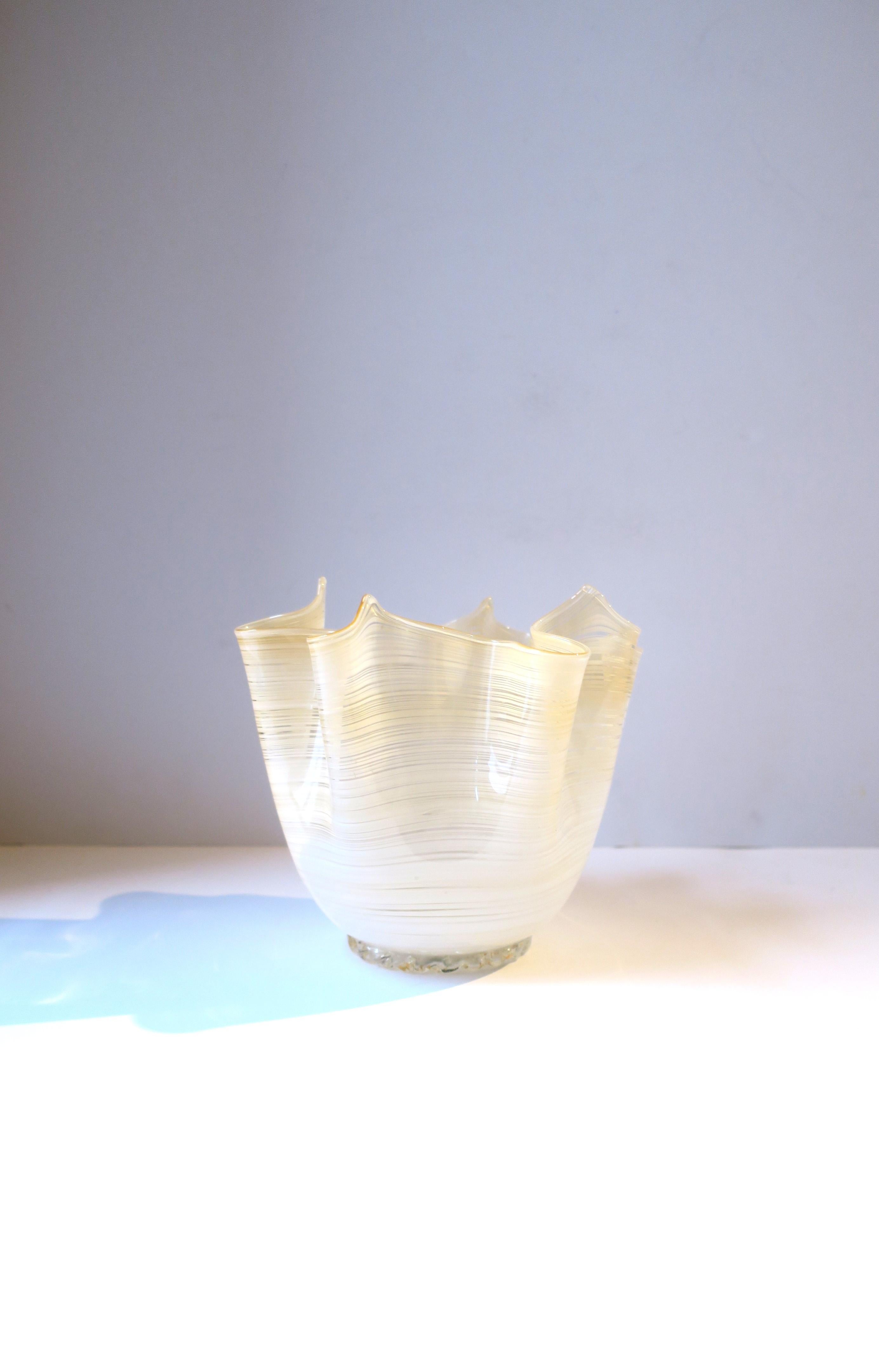 A beautiful authentic Italian Venetian Murano art glass handkerchief vase, in the Modern style, circa early-20th century, 1940s, Italy. This beautiful handcrafted piece has white and neutral art glass tones and ombre flow. Base is clear transparent