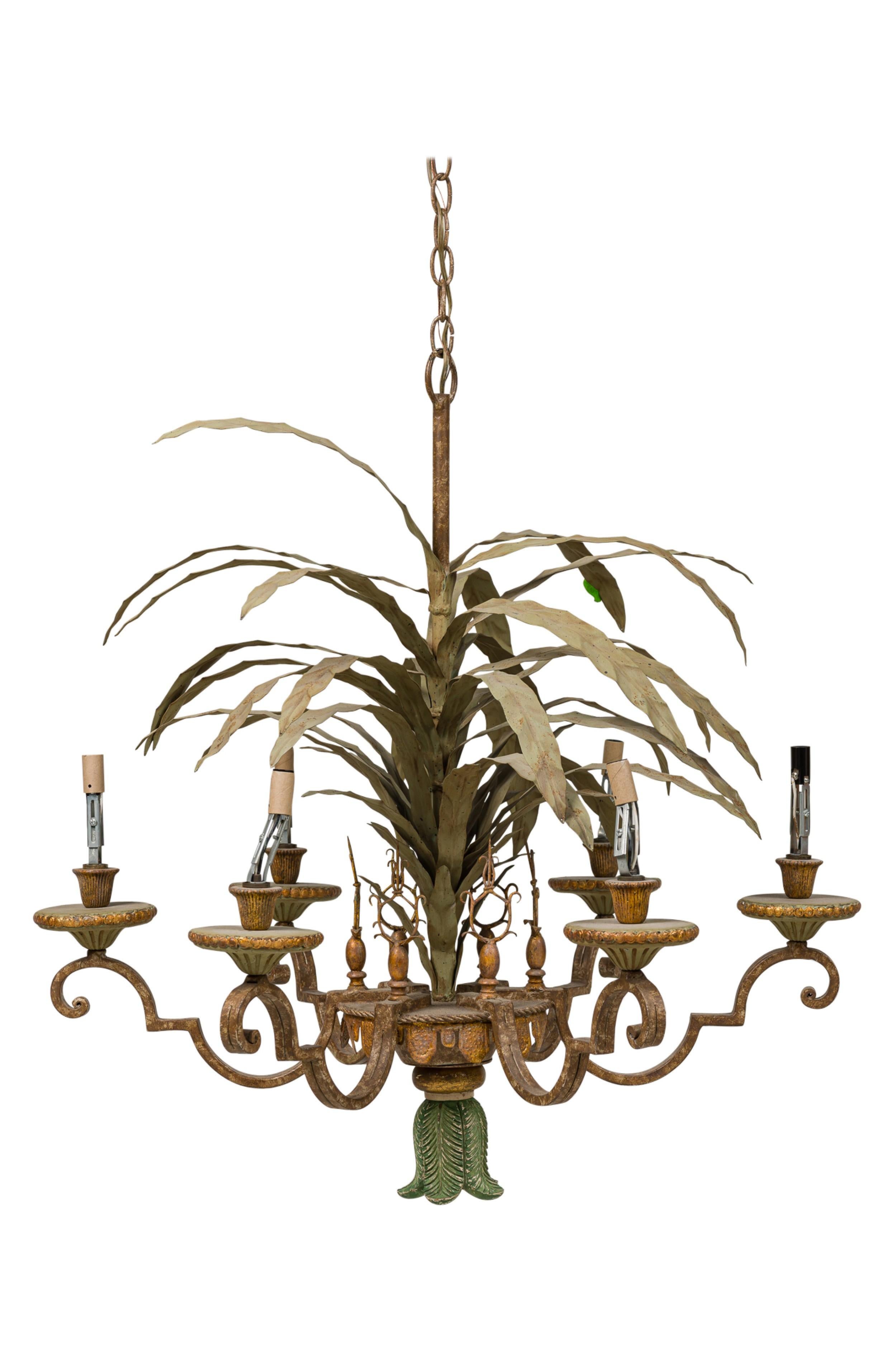 Italian Venetian style 6 armed tole chandelier, gilt and polychrome painted sheet and cast metal, the central standard modeled as a draped pedestal on foliate foot, issuing a frond of palm leaves, the six scrolling arms ending in cups topped with