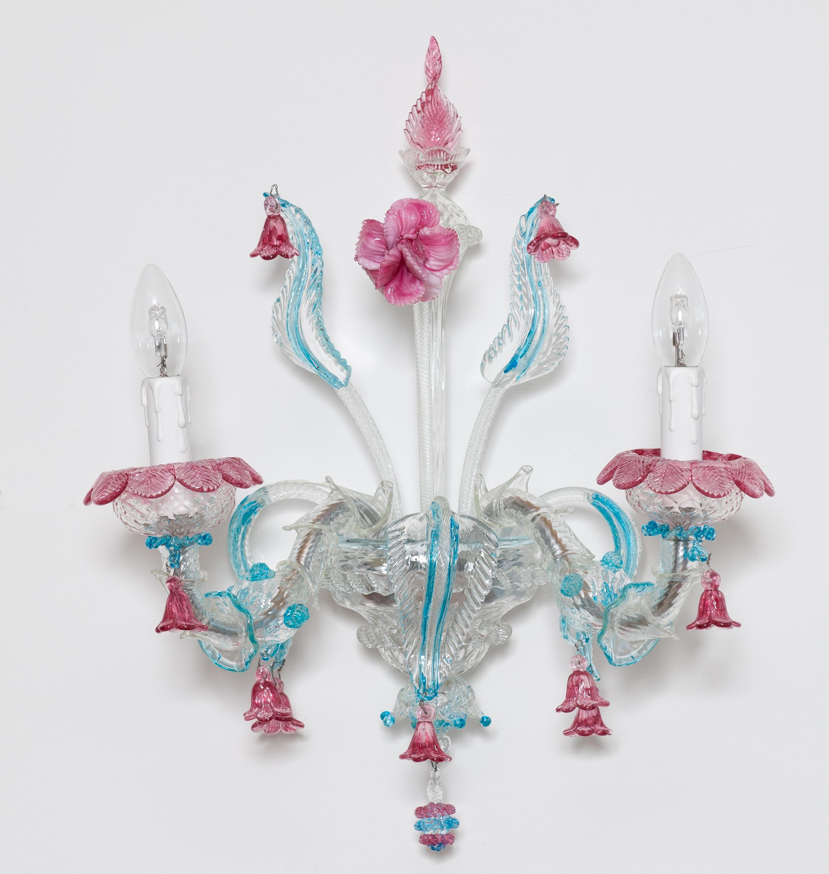 Single Sconce in Blown Murano Glass Pink and Light Blue Rezzonico 1980s Italy.
Gorgeous Italian Sconce in Blown Murano Glass Pink and Light Blue ca rezzonico, 1980s.
This is a portrait, entirely handcrafted in blown Murano glass, in the Italian