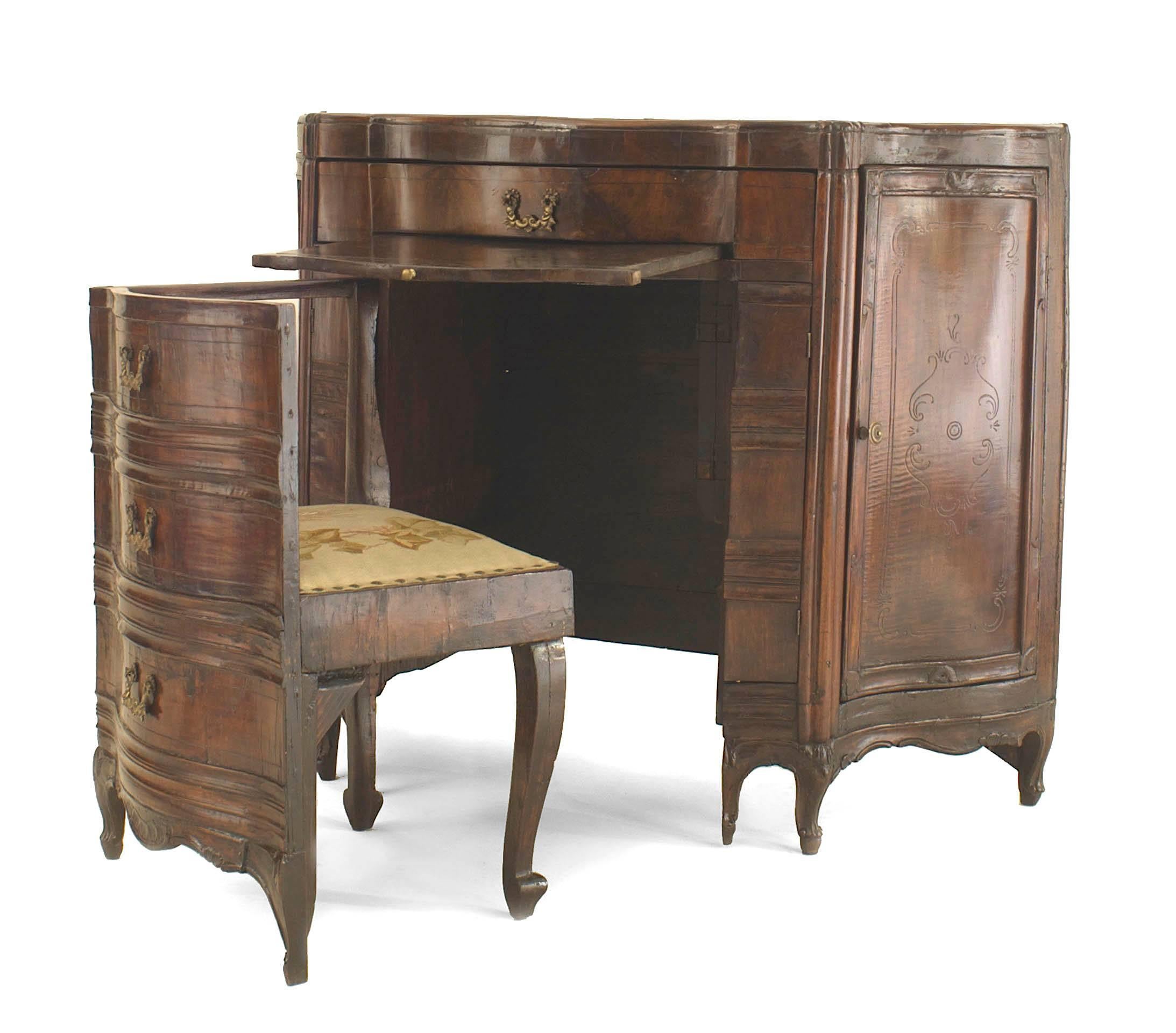 Italian Venetian (18th Century) walnut serpentine shaped desk with 2 side doors and 2 narrow front doors above a drawer with a pull out front interior chair having a left arm.
